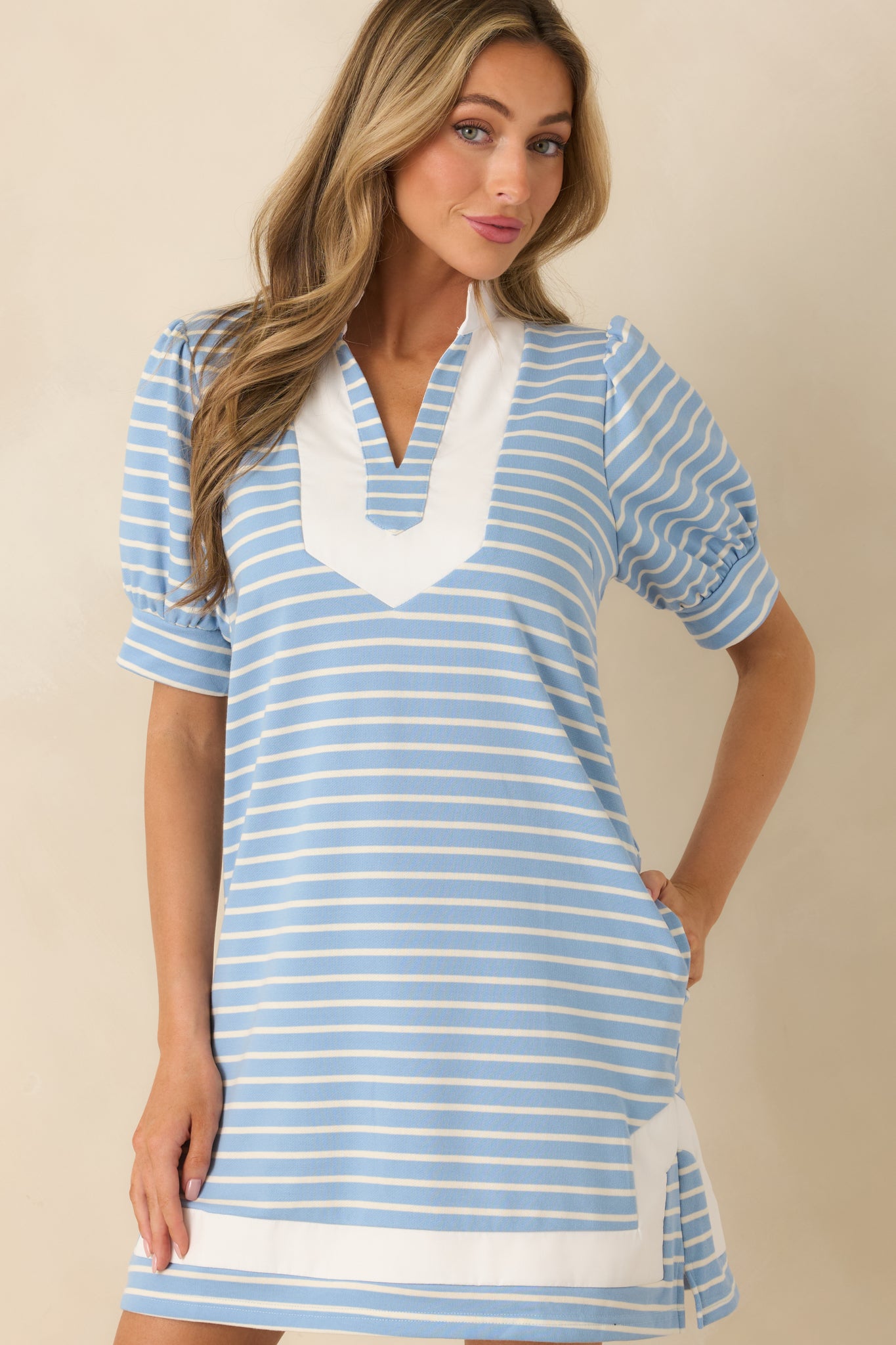 Close view highlighting the functional side pocket design in stretchy knit fabric.