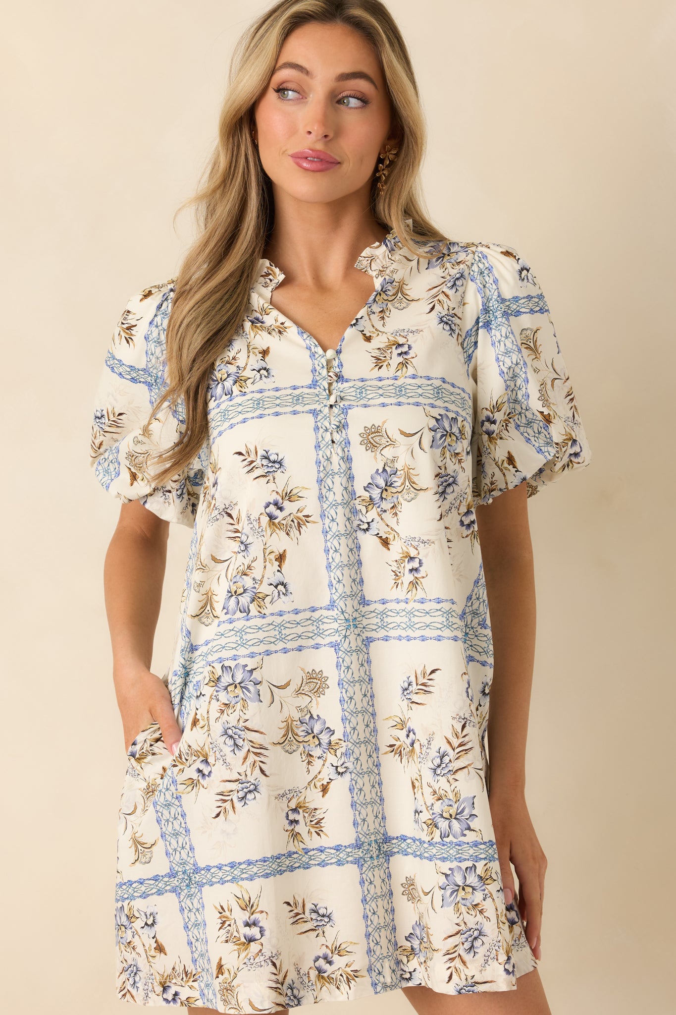 Close view of the puff sleeves, softly gathered for light, structured volume.