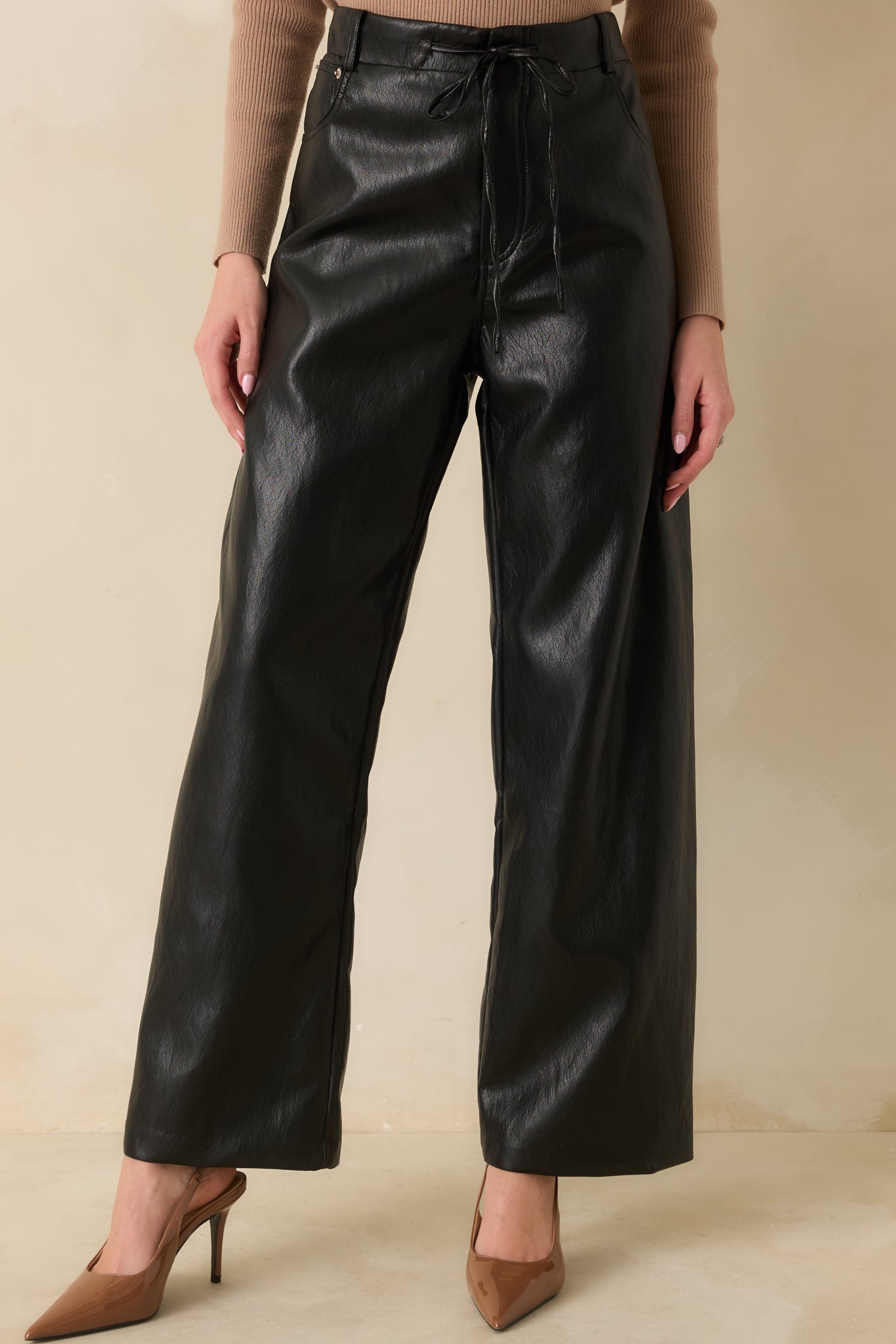 Close look at the straight, wide-leg cut and clean front finish.