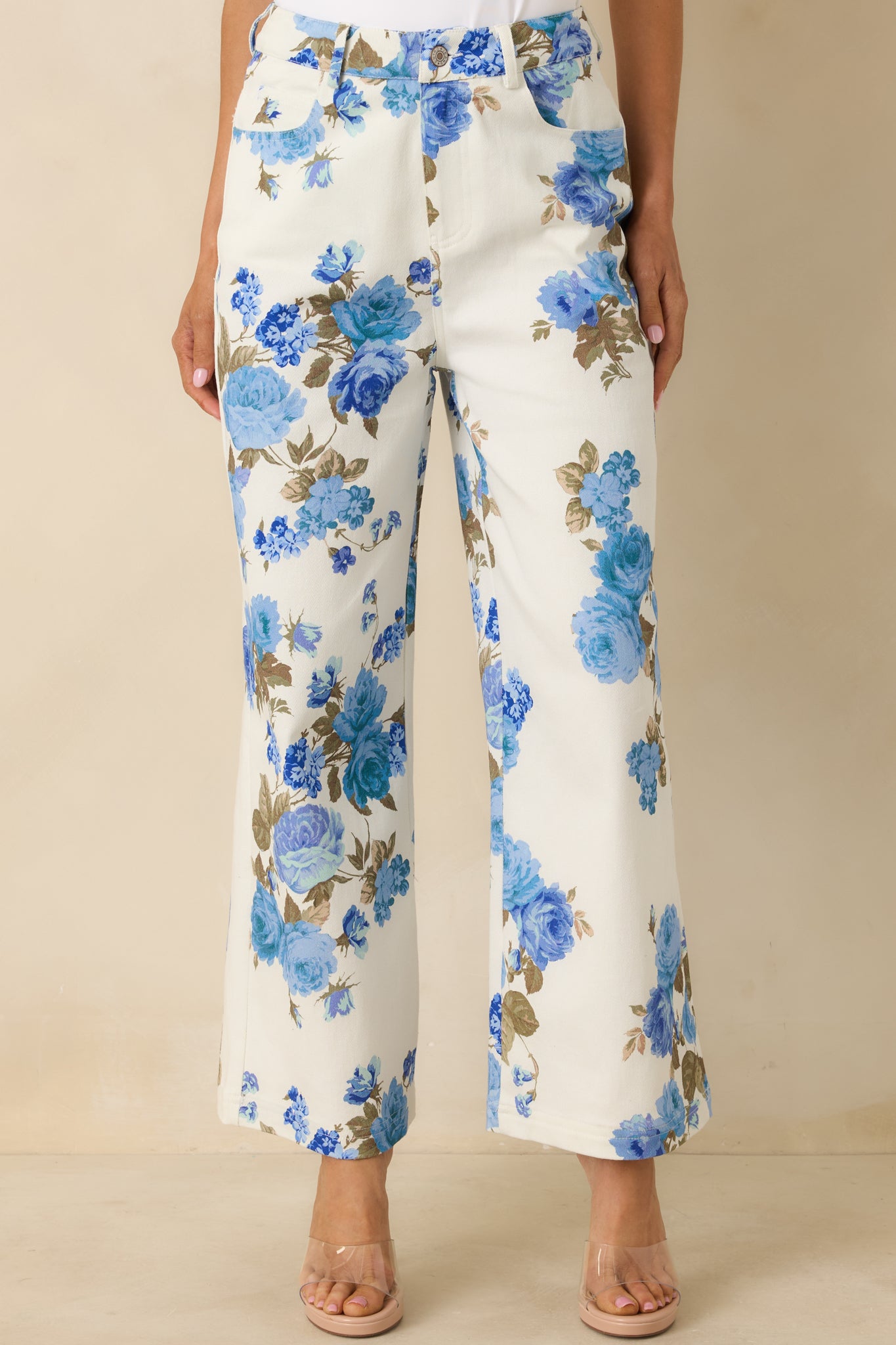 Closer view showing the functional front pockets and relaxed drape of the wide-leg pants.