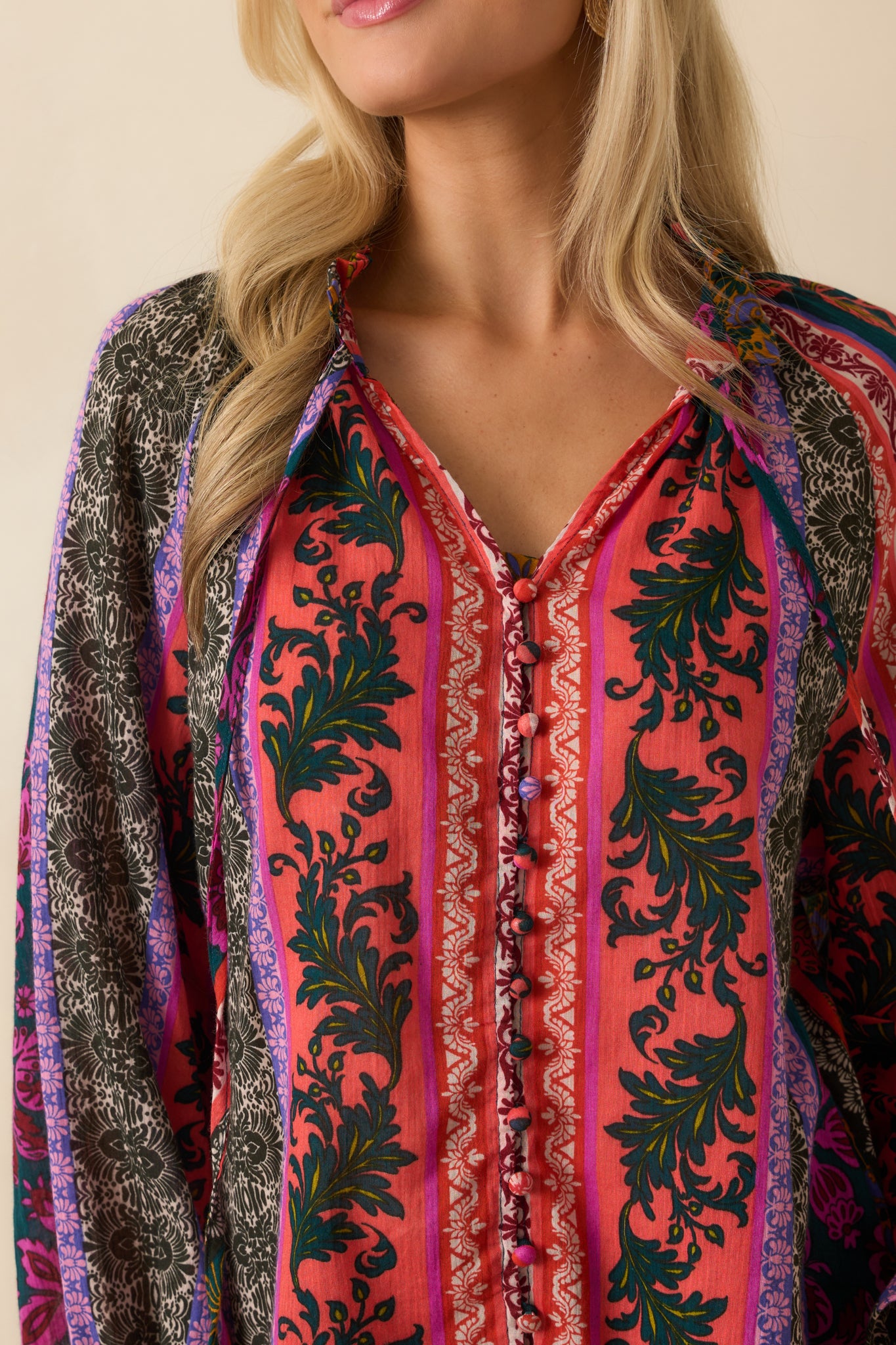 A close-up detail of the ruffle trim and multicolor patchwork fabric.