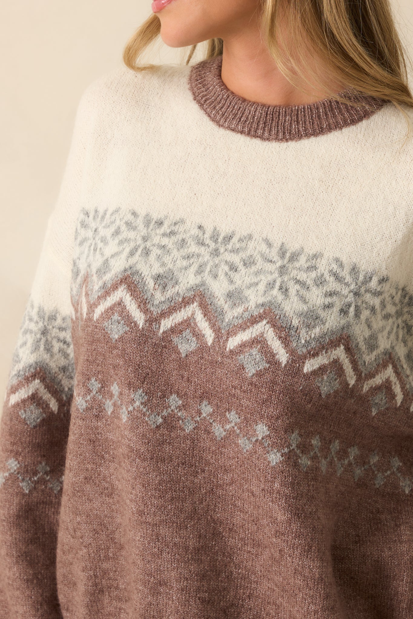 Detailed close-up of the mauve Fair Isle pattern and ribbed trim, capturing the knit texture and craftsmanship.