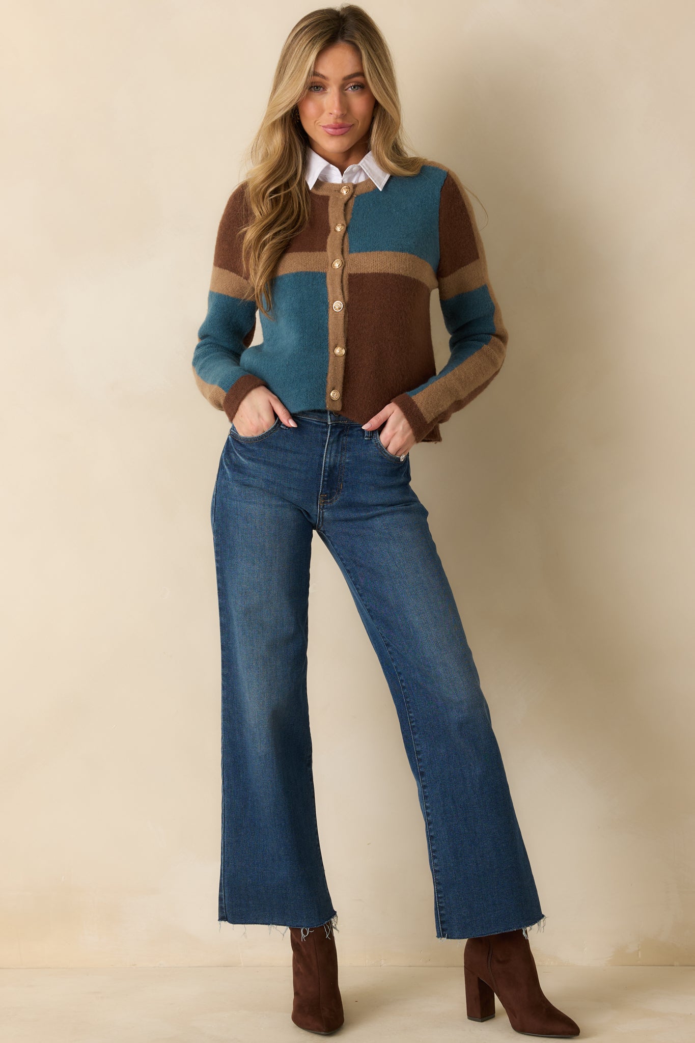 Front-facing color block cardigan highlighting the easy silhouette and clean knit finish.