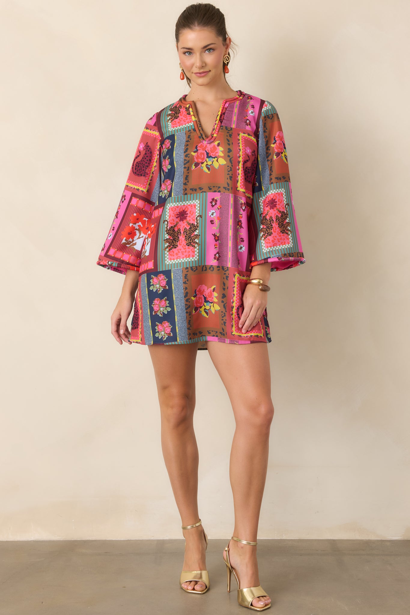 Colorful Vintage Vignette mini dress featuring a relaxed A-line silhouette, soft corded V-neckline, wide three-quarter sleeves, and matching corded trim.