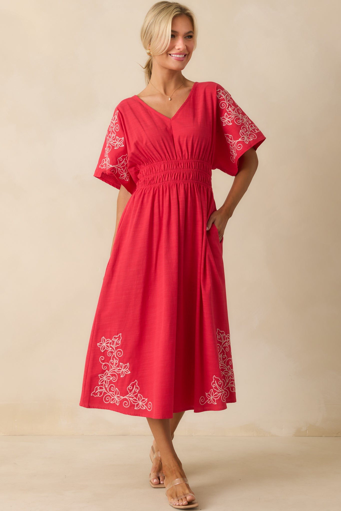 Cotton-rayon blend dress with embroidered details and a relaxed fit.