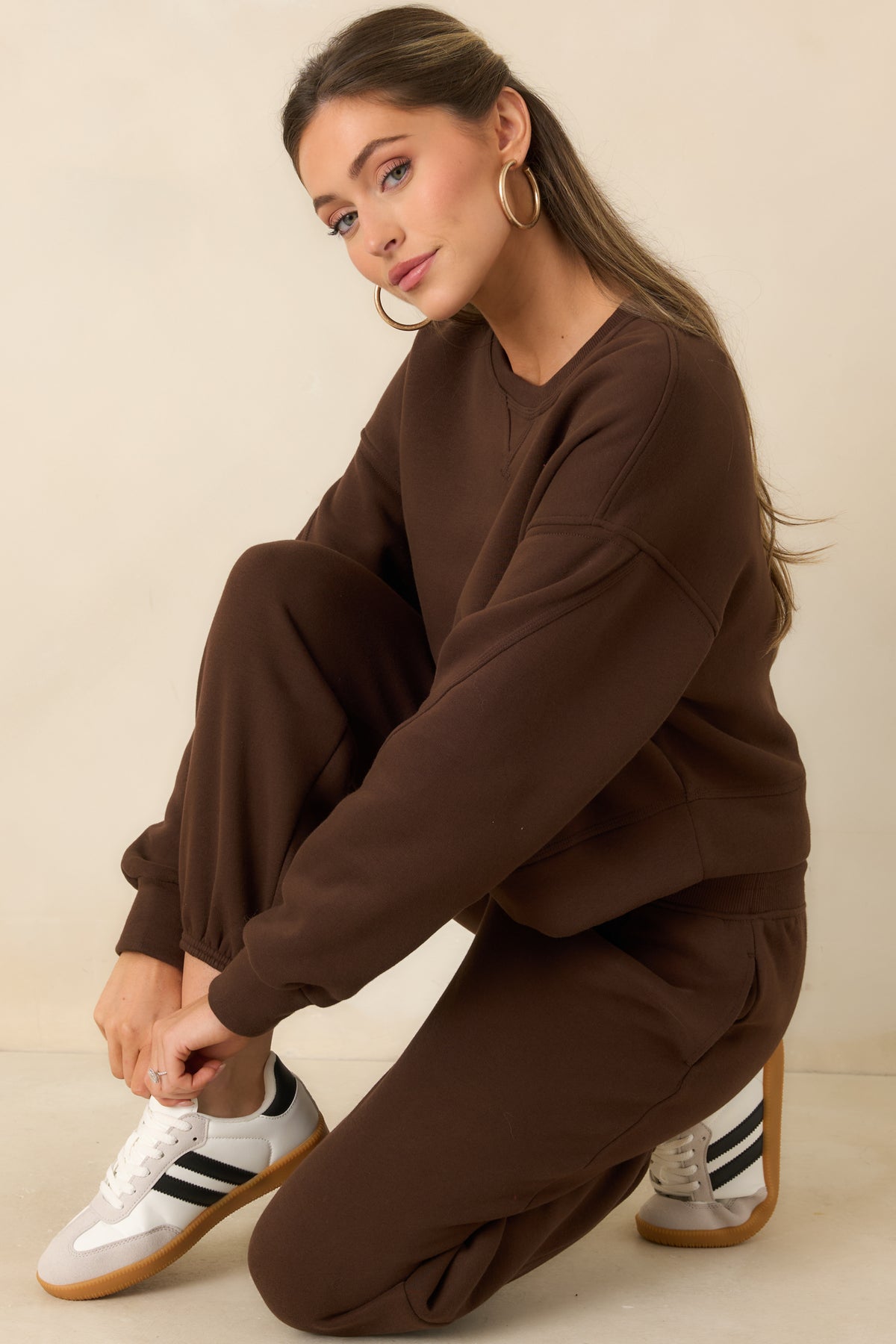 Relaxed cotton-blend fleece top with a classic crew neckline, dropped shoulders, and long sleeves.