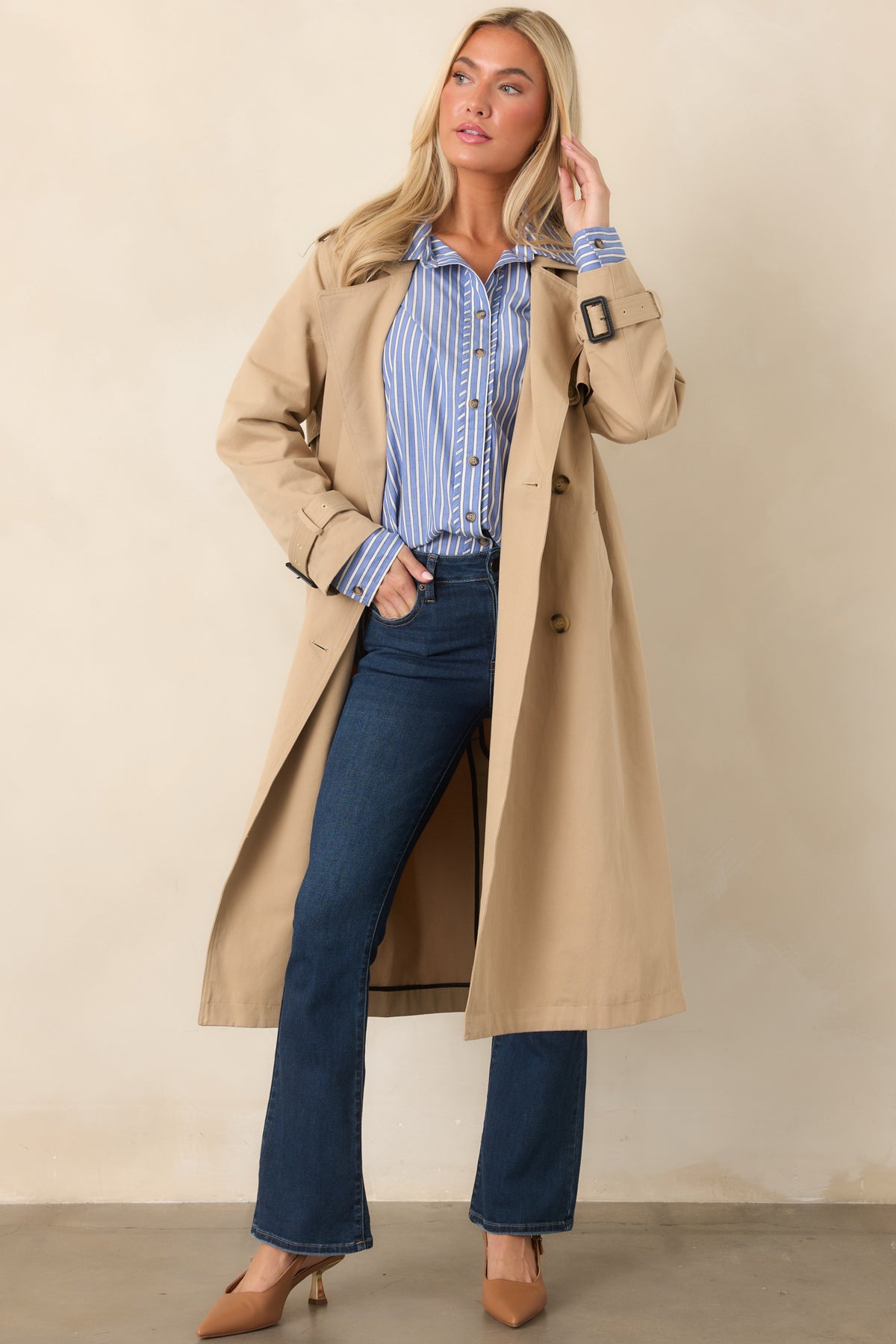 Cotton denim flare pants with a classic mid-rise construction, contrast stitching, traditional pockets, and softly flared hems.