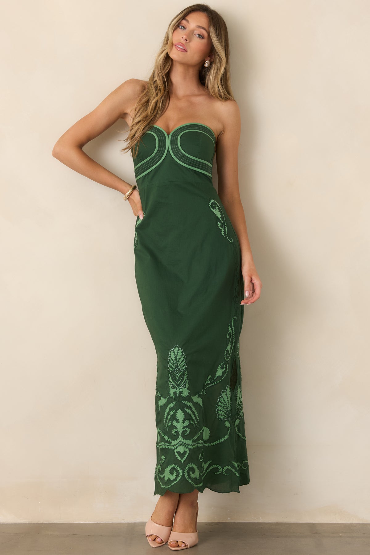 Cotton midi dress highlighted by sweeping light green scrollwork and a clean, elongated silhouette.