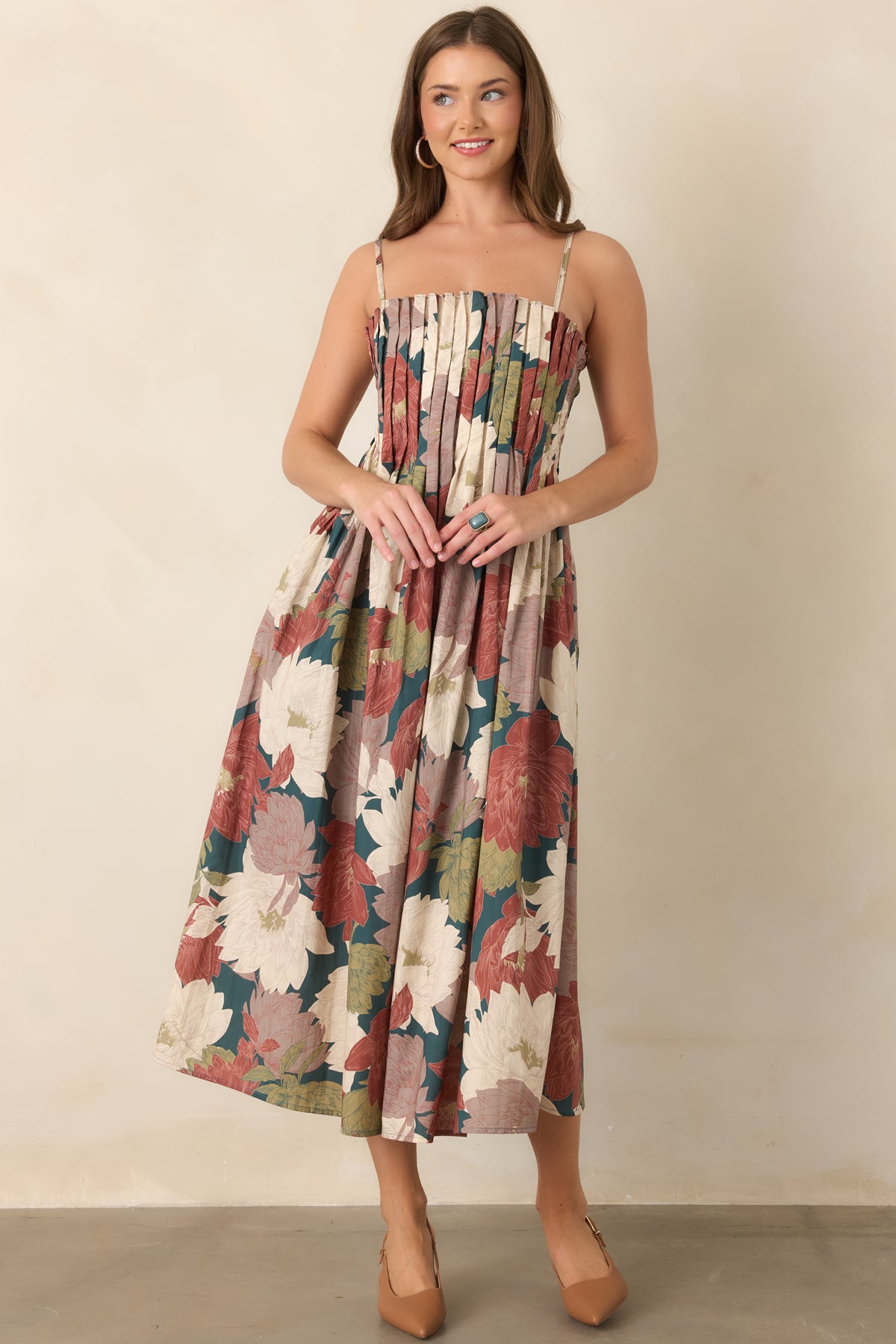 Cotton midi dress with a textured pleated bodice and comfortable smocked back.