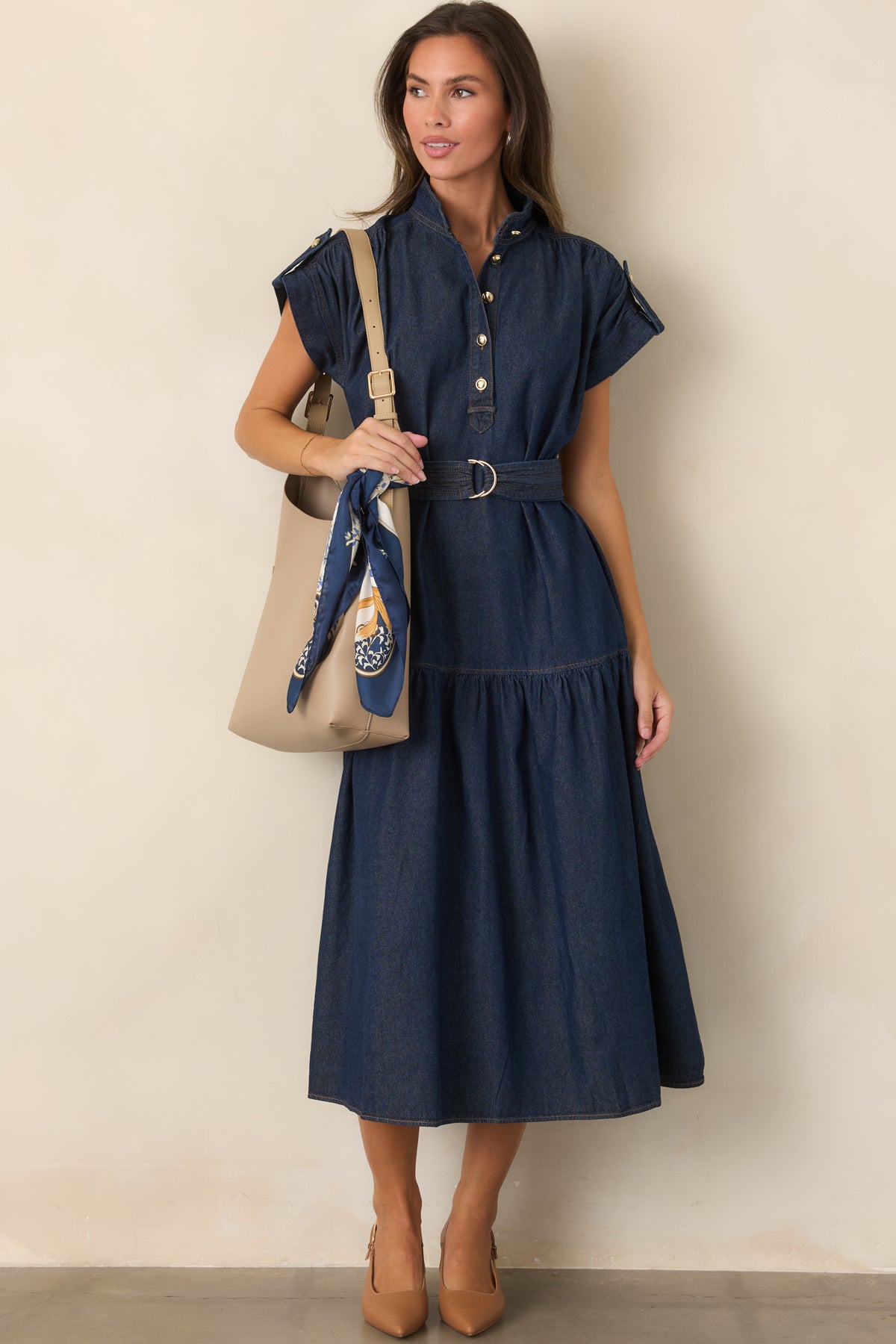 Cotton-rich dress featuring a stand collar and gold-tone partial button placket.