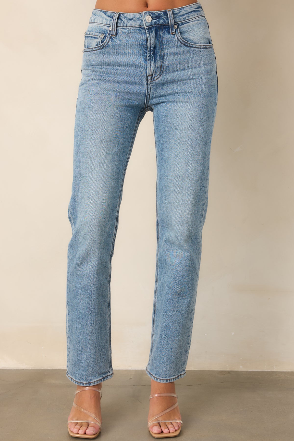 Cotton-rich stretch jeans featuring subtle fading and a clean full-length straight leg.