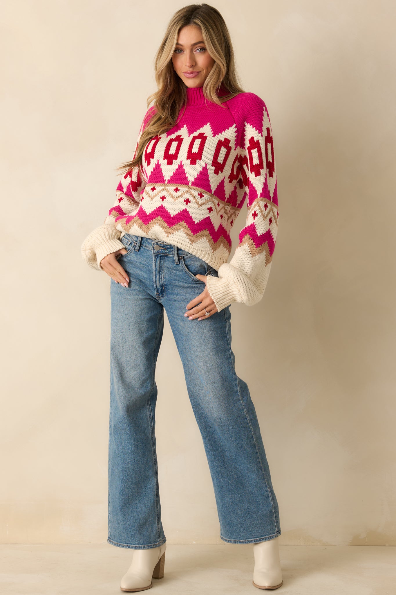 Cozy acrylic-blend knit top featuring ribbed cuffs and hem and a colorful Fair Isle pattern.