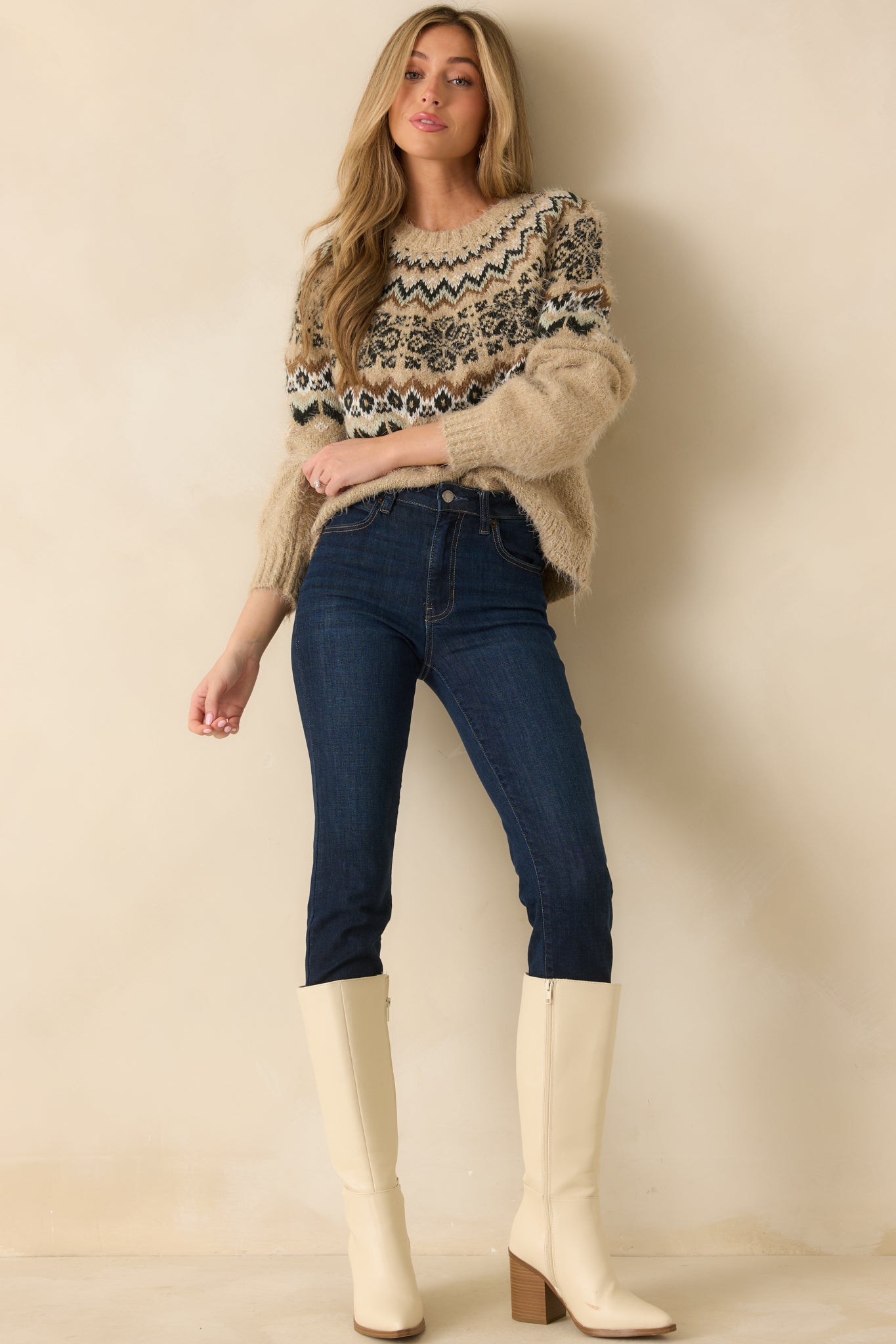 Cozy heathered sweater featuring the patterned yoke and ribbed hem.