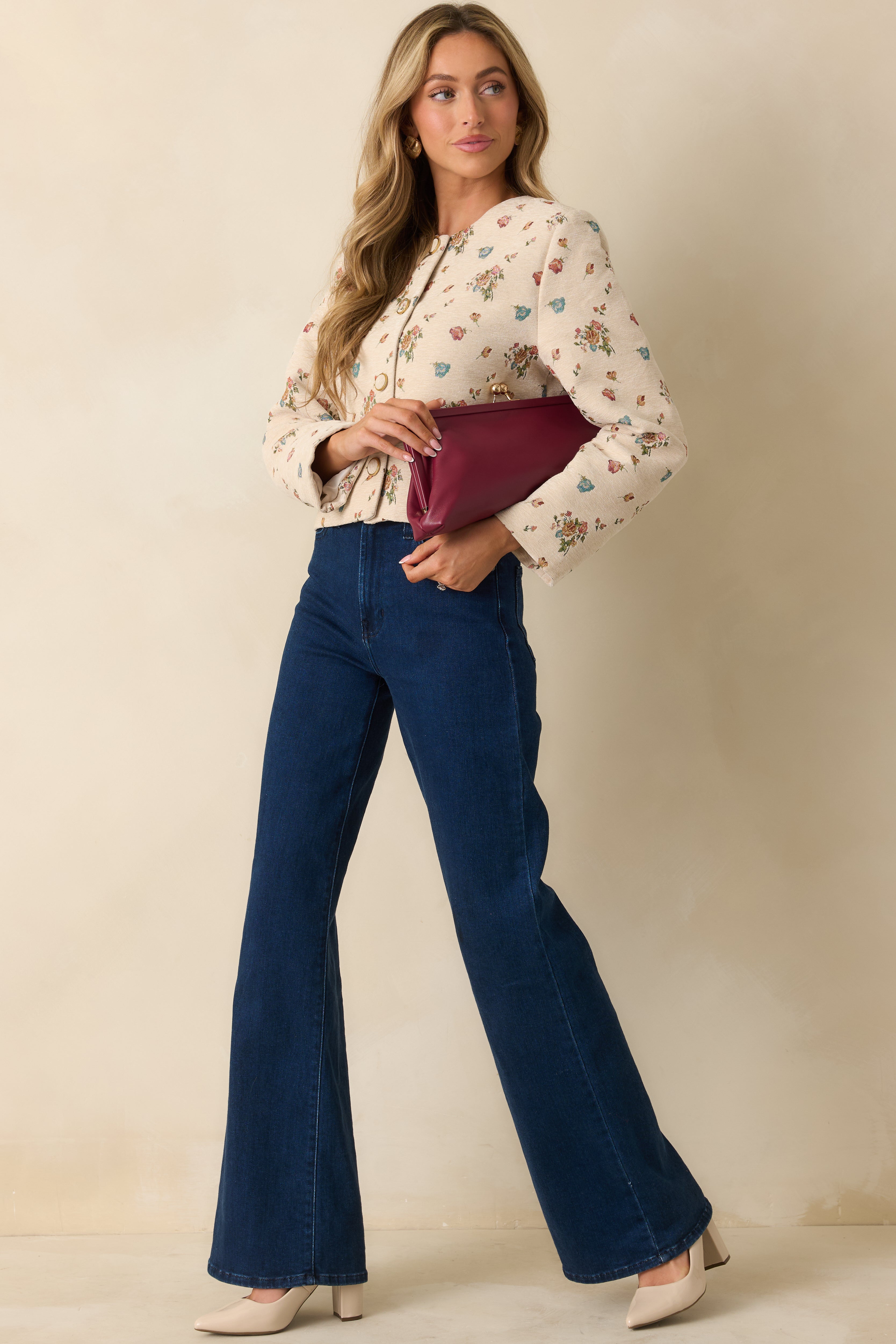 Cream floral tapestry jacket with gold button front closure and structured fit.