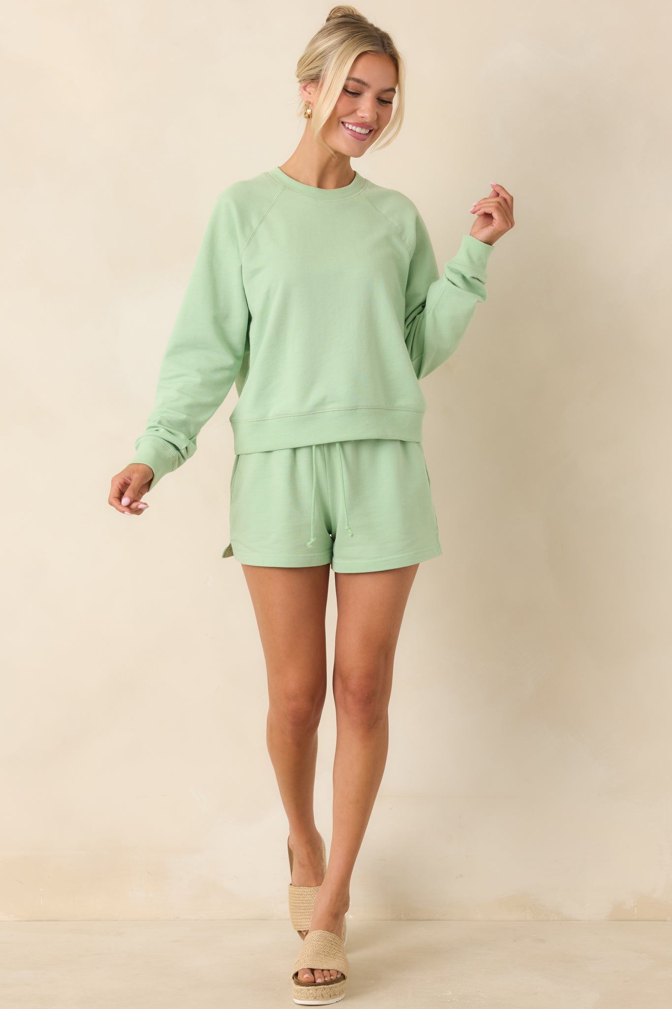 Crewneck sweatshirt with raglan sleeves and a relaxed, flattering fit.