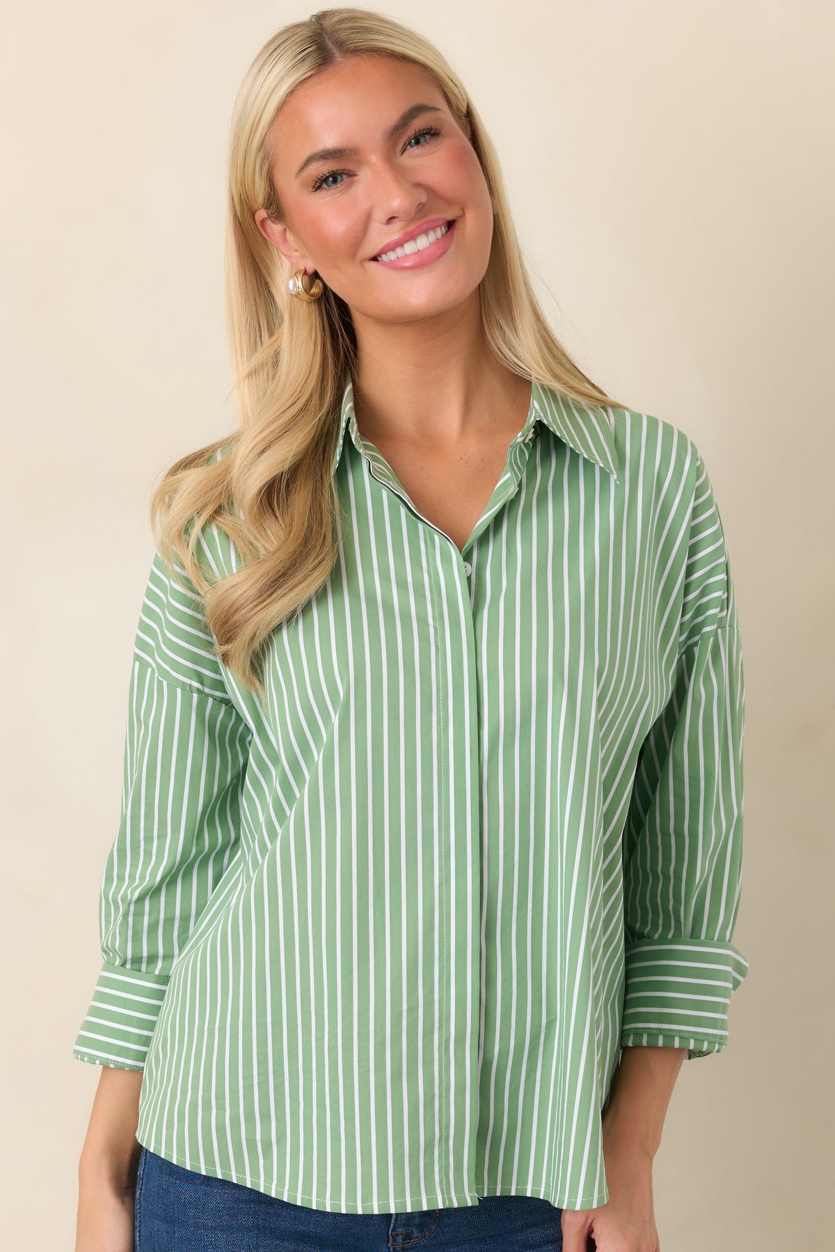 Close view of the front button placket and crisp cotton-blend fabric, highlighting the shirt's polished finish.