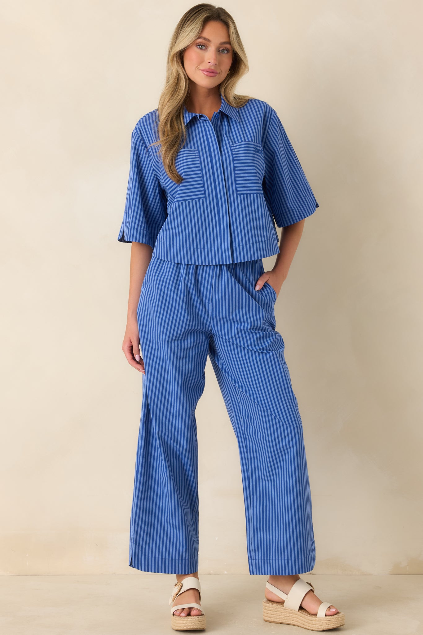 100% cotton pants with crisp vertical stripes, an elastic waistband, and an effortless breezy fit.