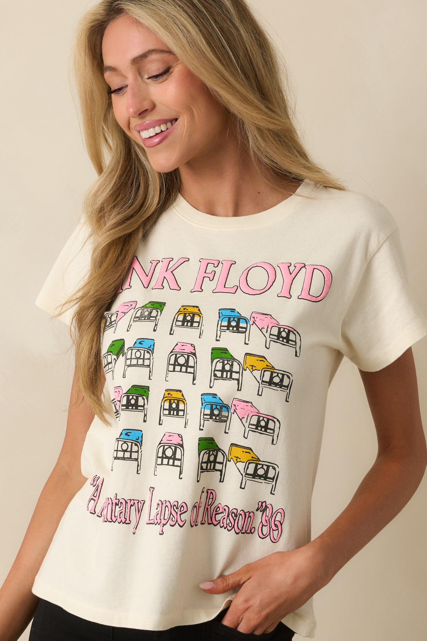 A cropped angled view highlighting the crew neckline and upper portion of the front graphic.