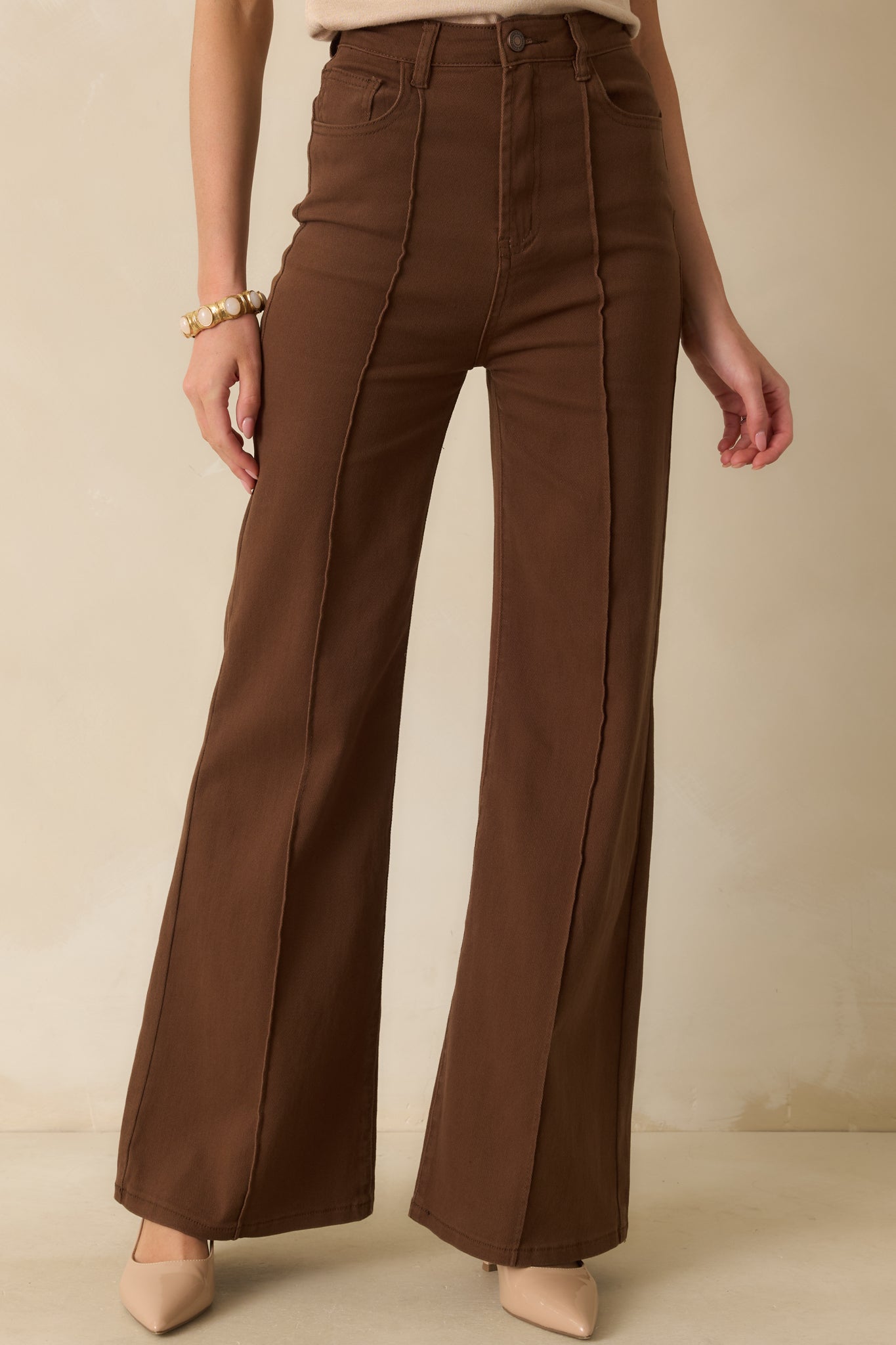 A cropped angled view highlighting the pocket placement and belt loops of the jeans.