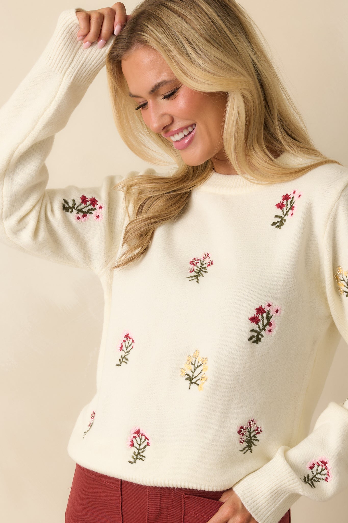 Cropped front view emphasizing subtle bead accents throughout the floral pattern.