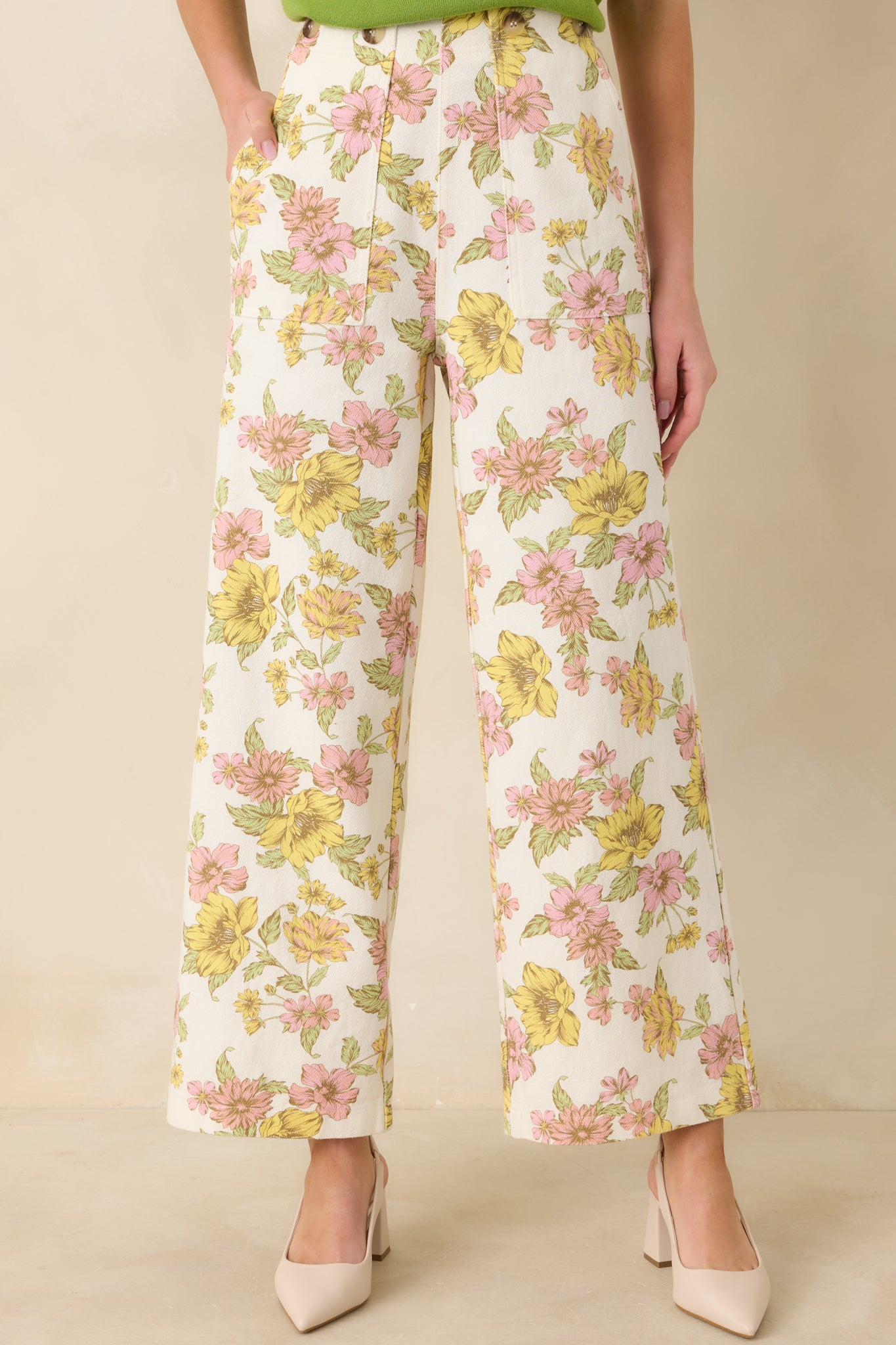 Cropped front view focusing on the floral pattern across the hips and upper leg.