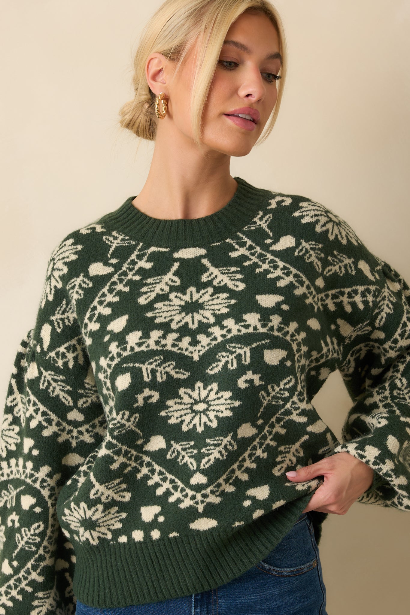 Cropped view emphasizing the drop shoulder design and soft knit texture.