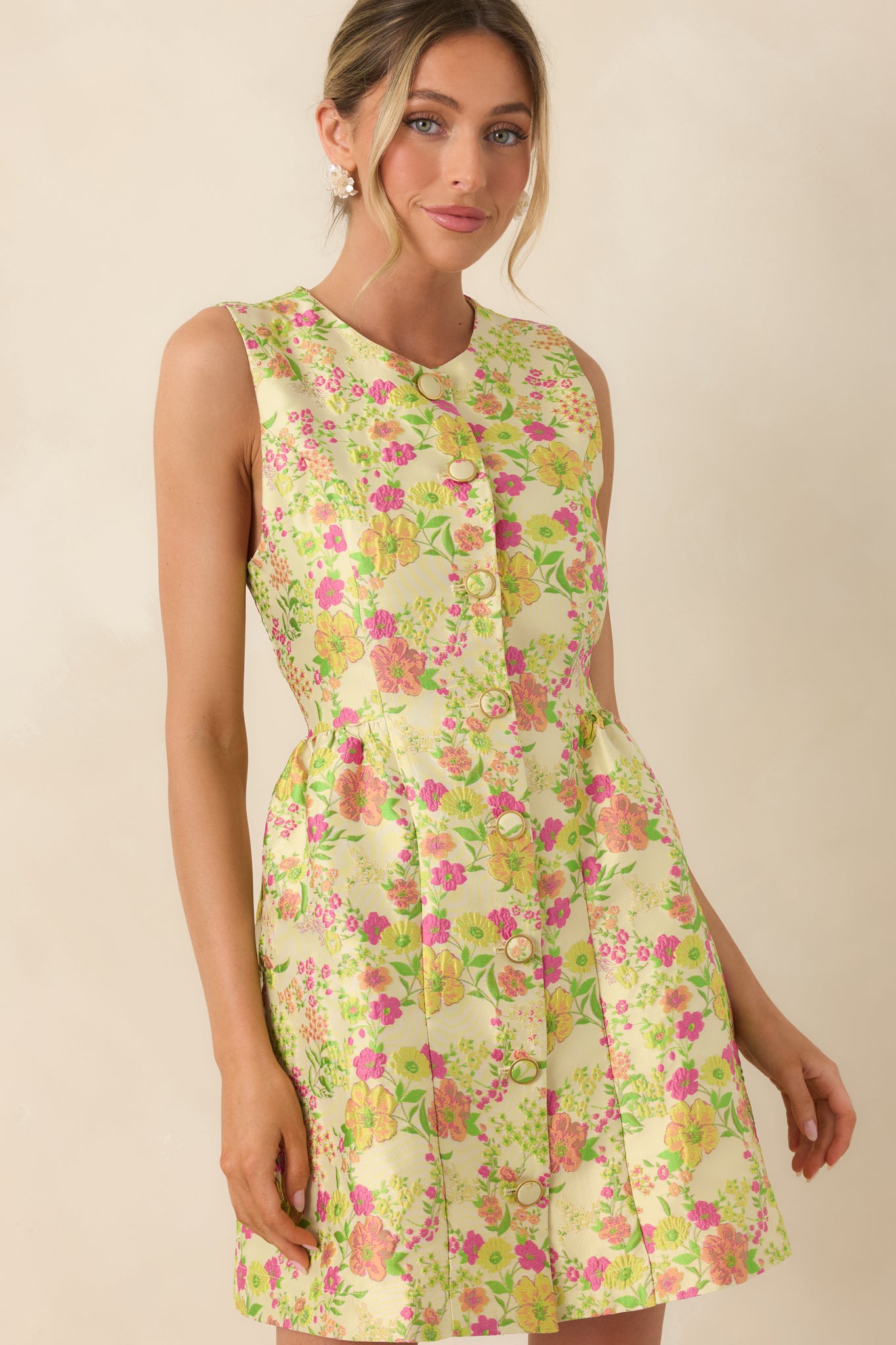 Cropped view of skirt portion showing structured A-line shape and colorful floral pattern.