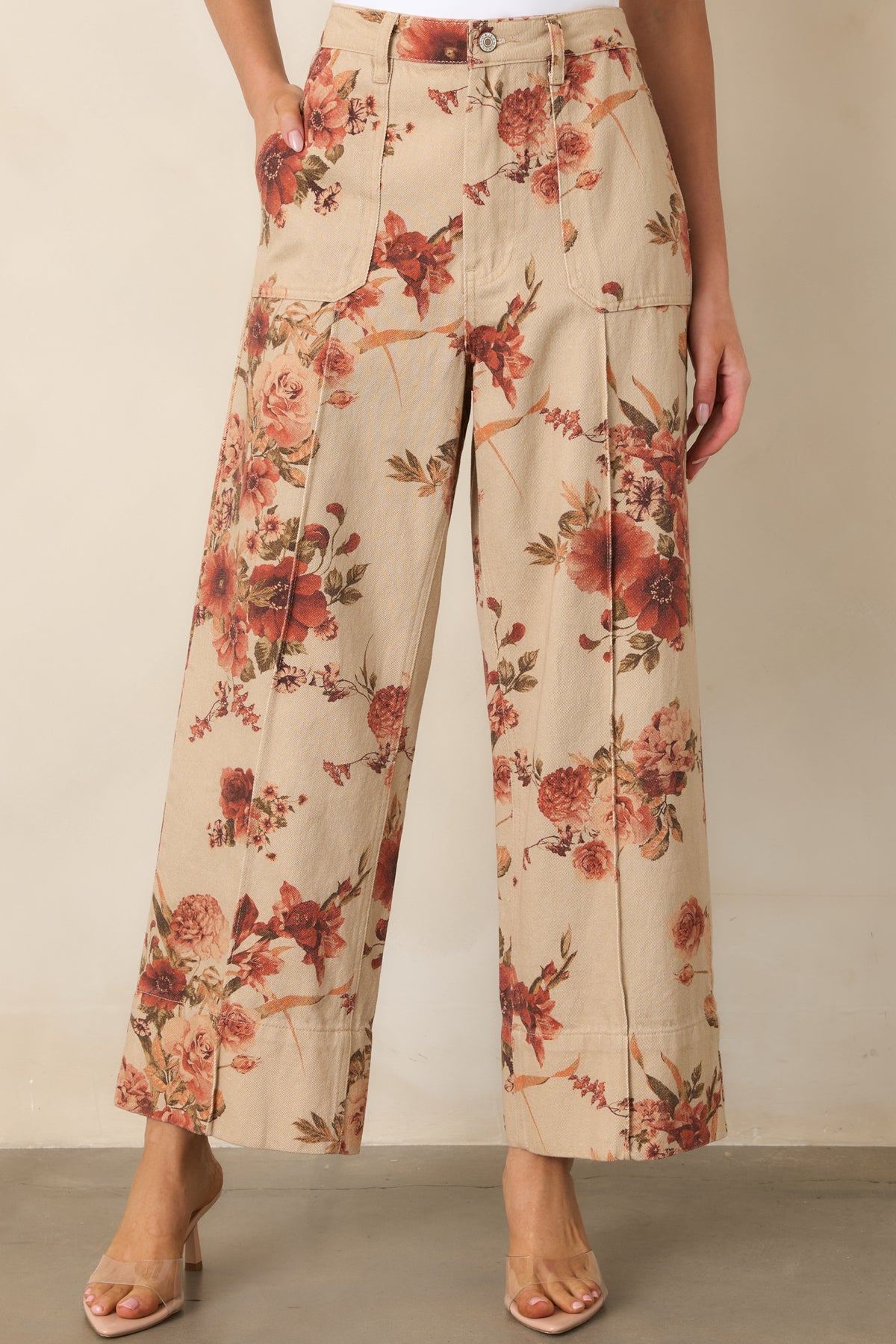 Cropped wide-leg pants showcasing the structured cotton fabric, botanical print, and high-rise waist.