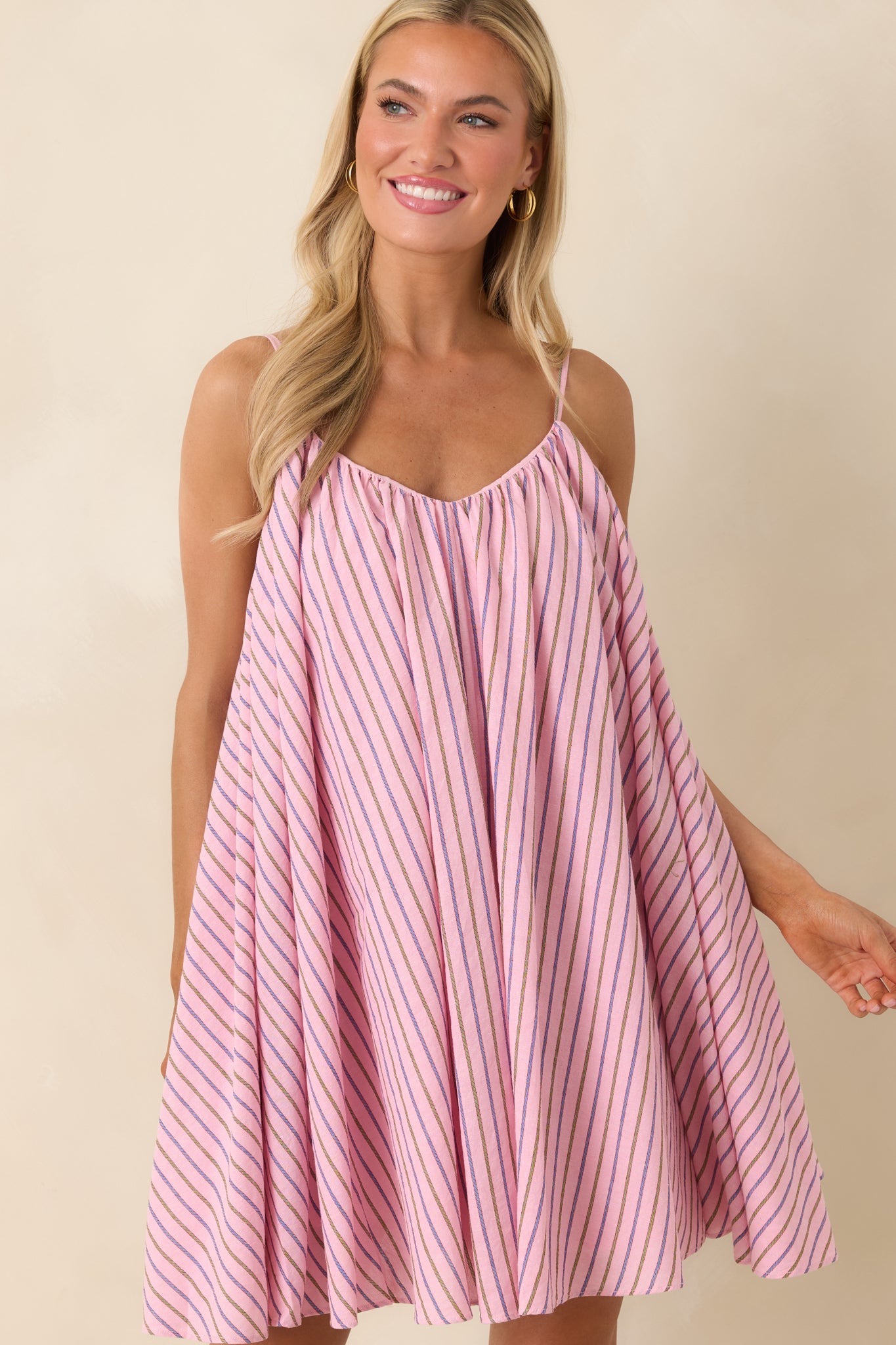 Detail-focused view of pink stripe pattern and soft flowing shape.