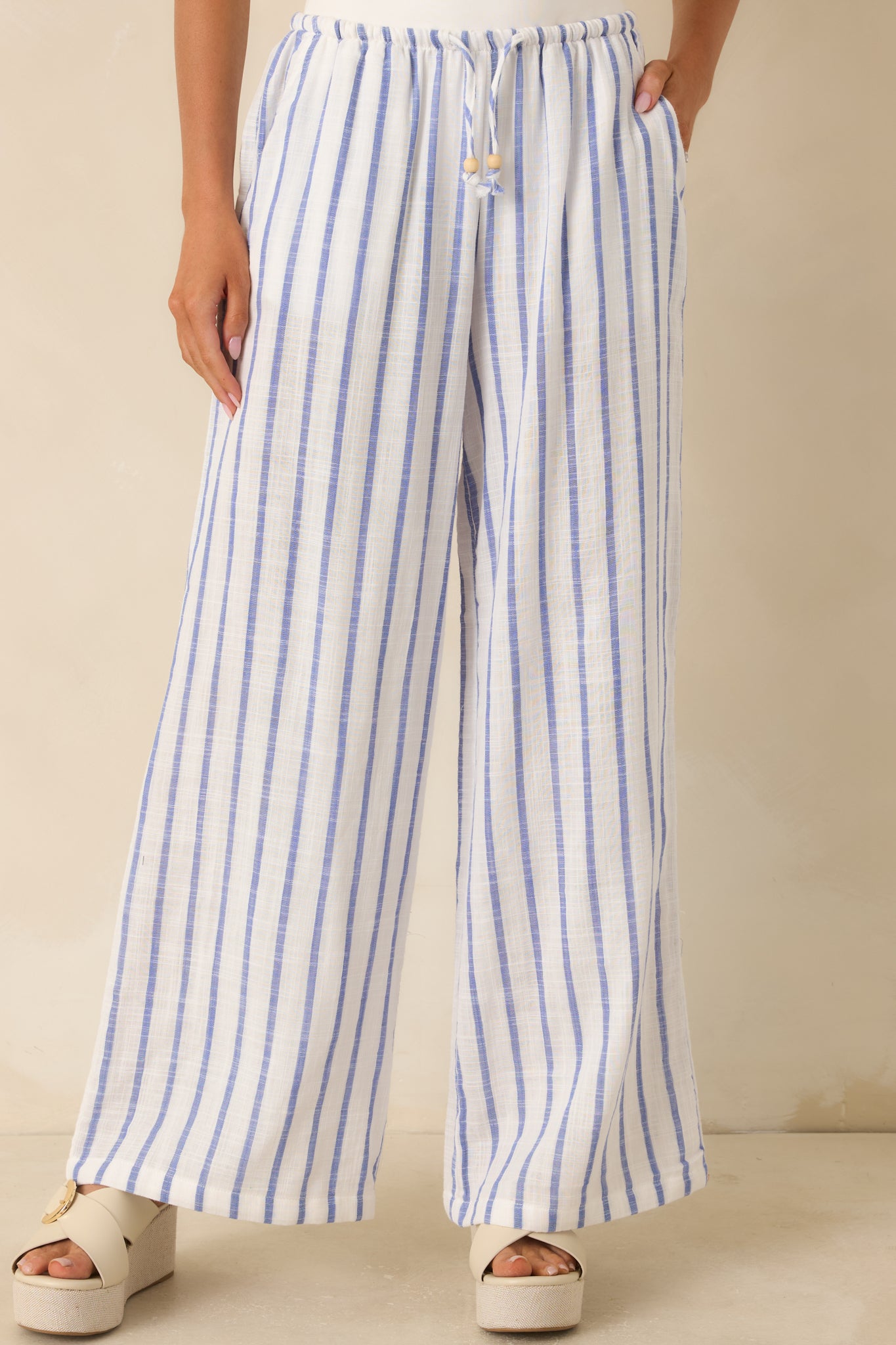 Detailed front view of the relaxed wide-leg silhouette and soft gauzy cotton texture.