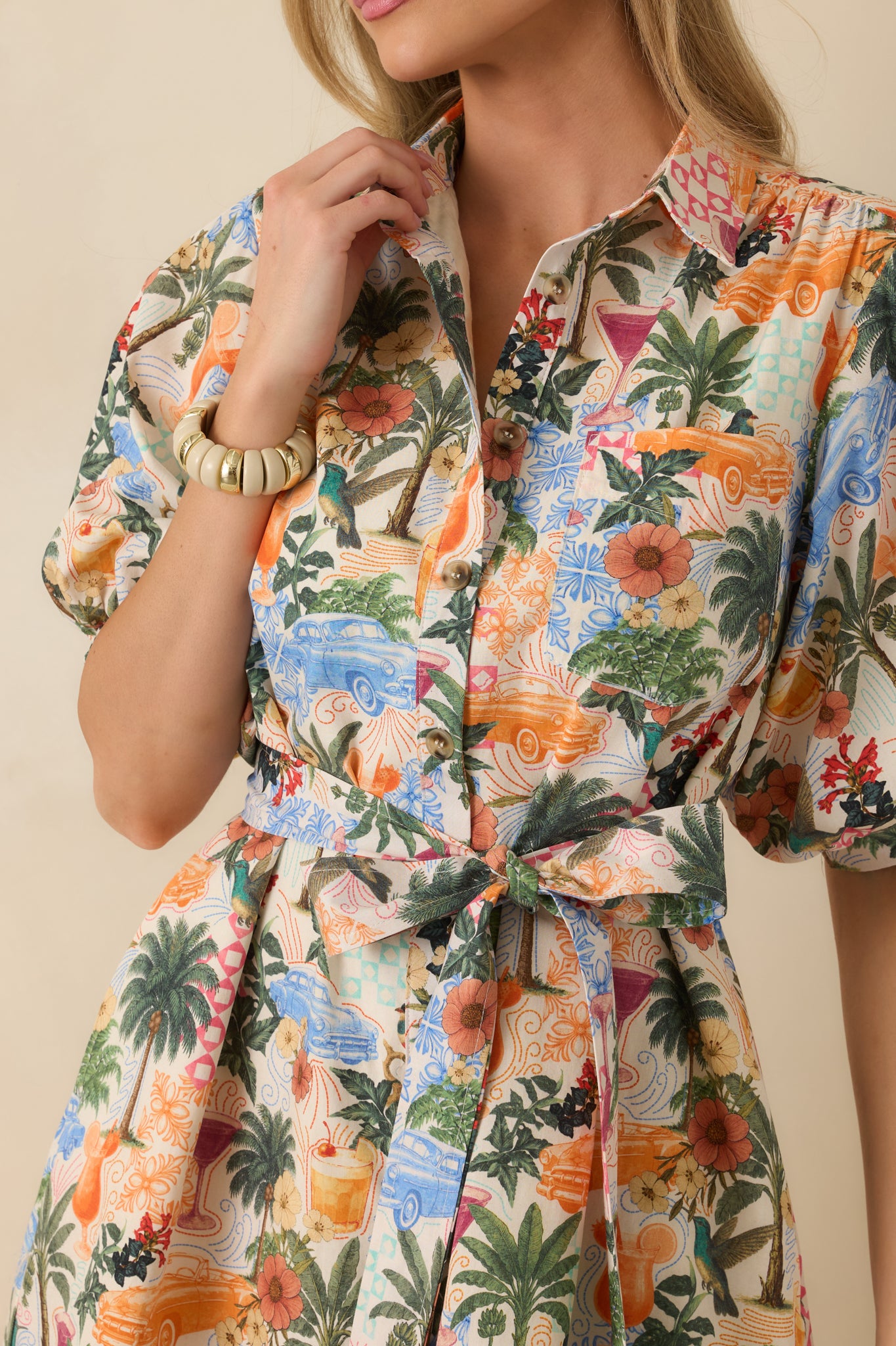 Detailed look at the button-front closure and structured collar on the multicolor woven fabric.