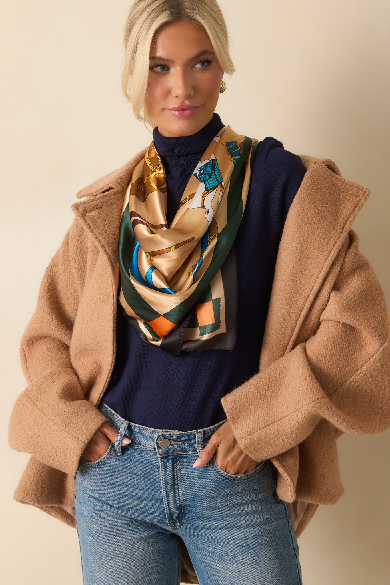 Detailed look at the sleeve and pocket placement on the wool-blend coat.