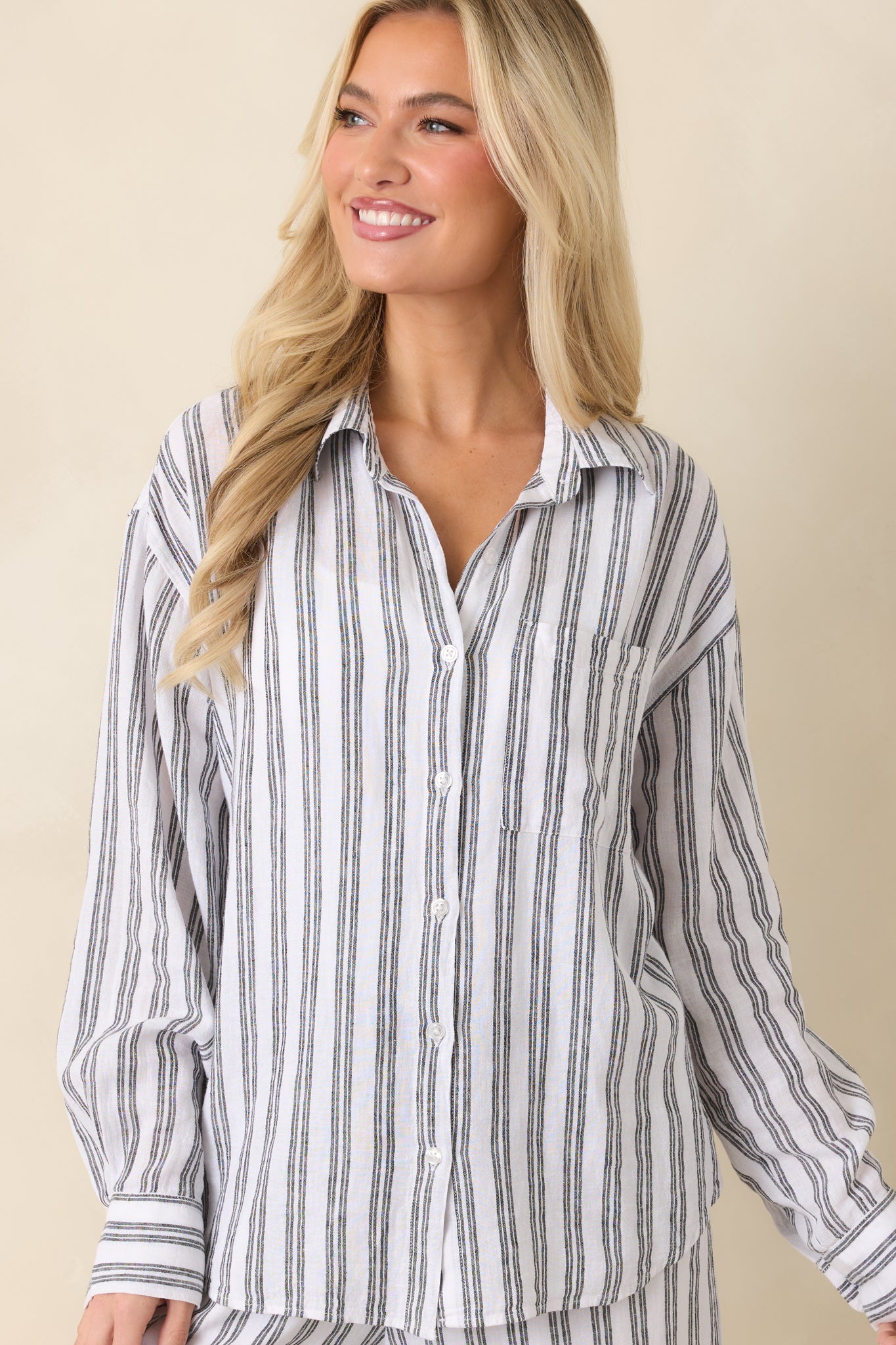 Detailed look at vertical stripes with soft fabric and relaxed structure.
