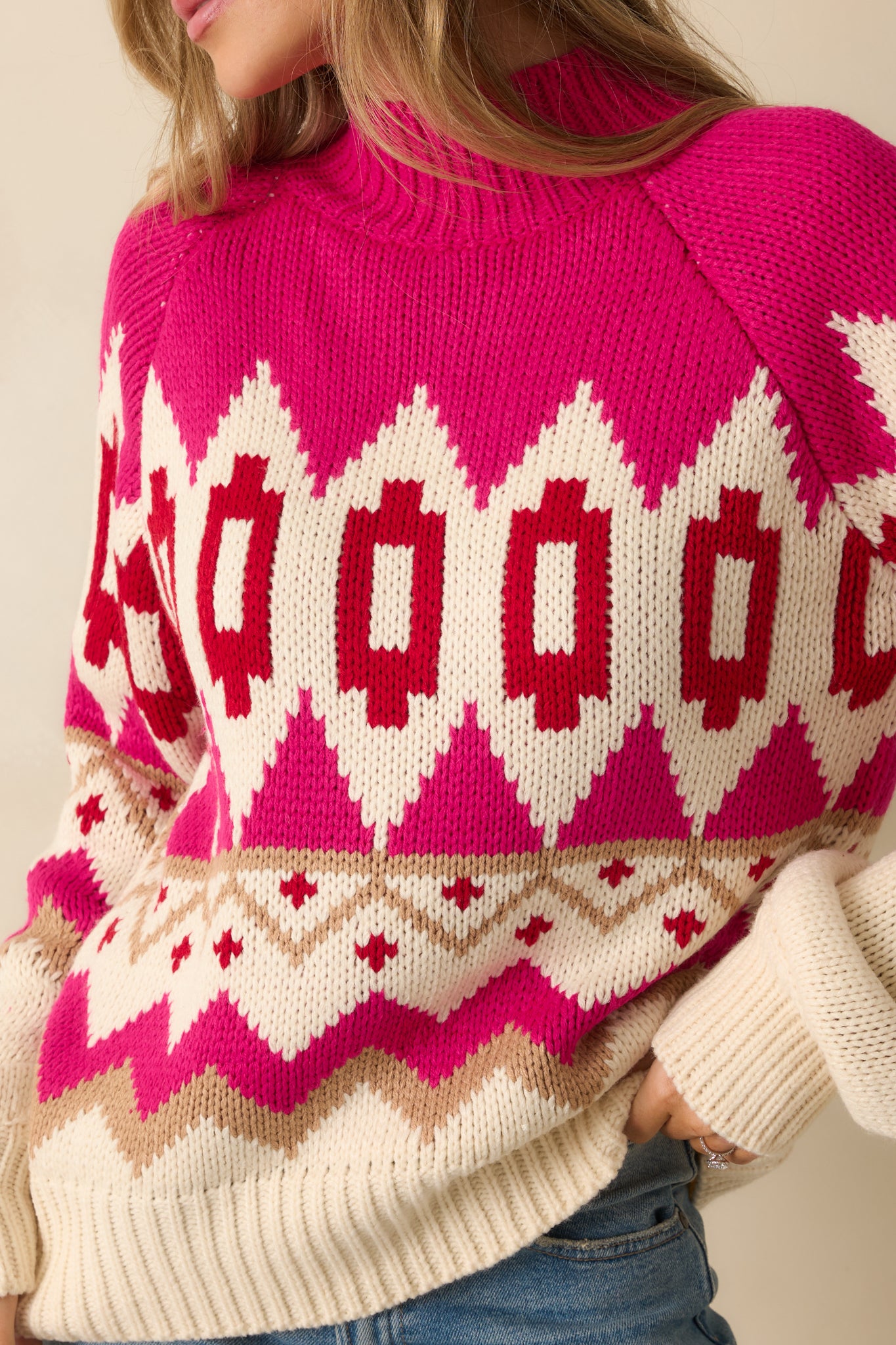 Detailed look at the intricate Fair Isle knit pattern and soft acrylic-blend texture.