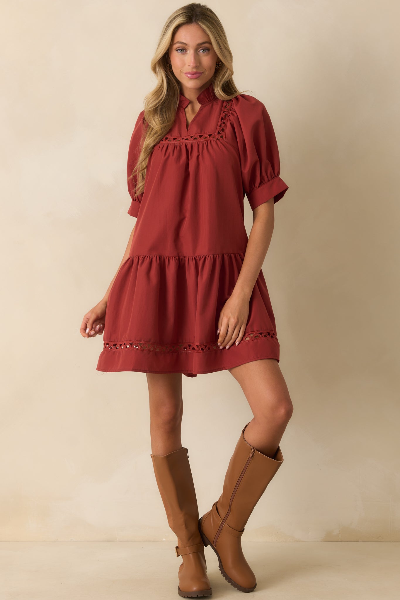 Dress featuring ladder lace inserts throughout and a tiered hem.