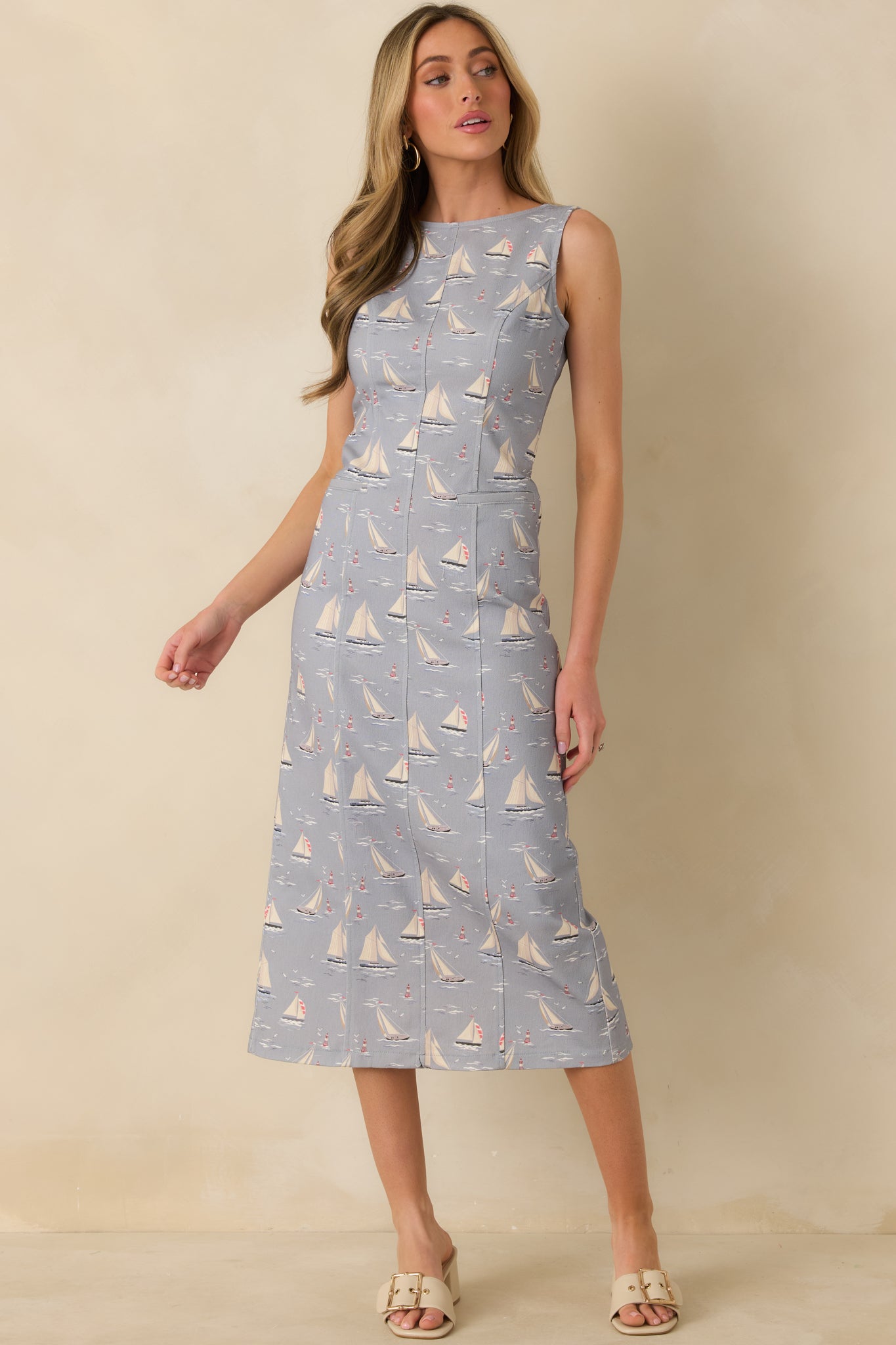Dusty blue midi dress with a breathable cotton-blend knit, round neckline, and effortless warm-weather styling.
