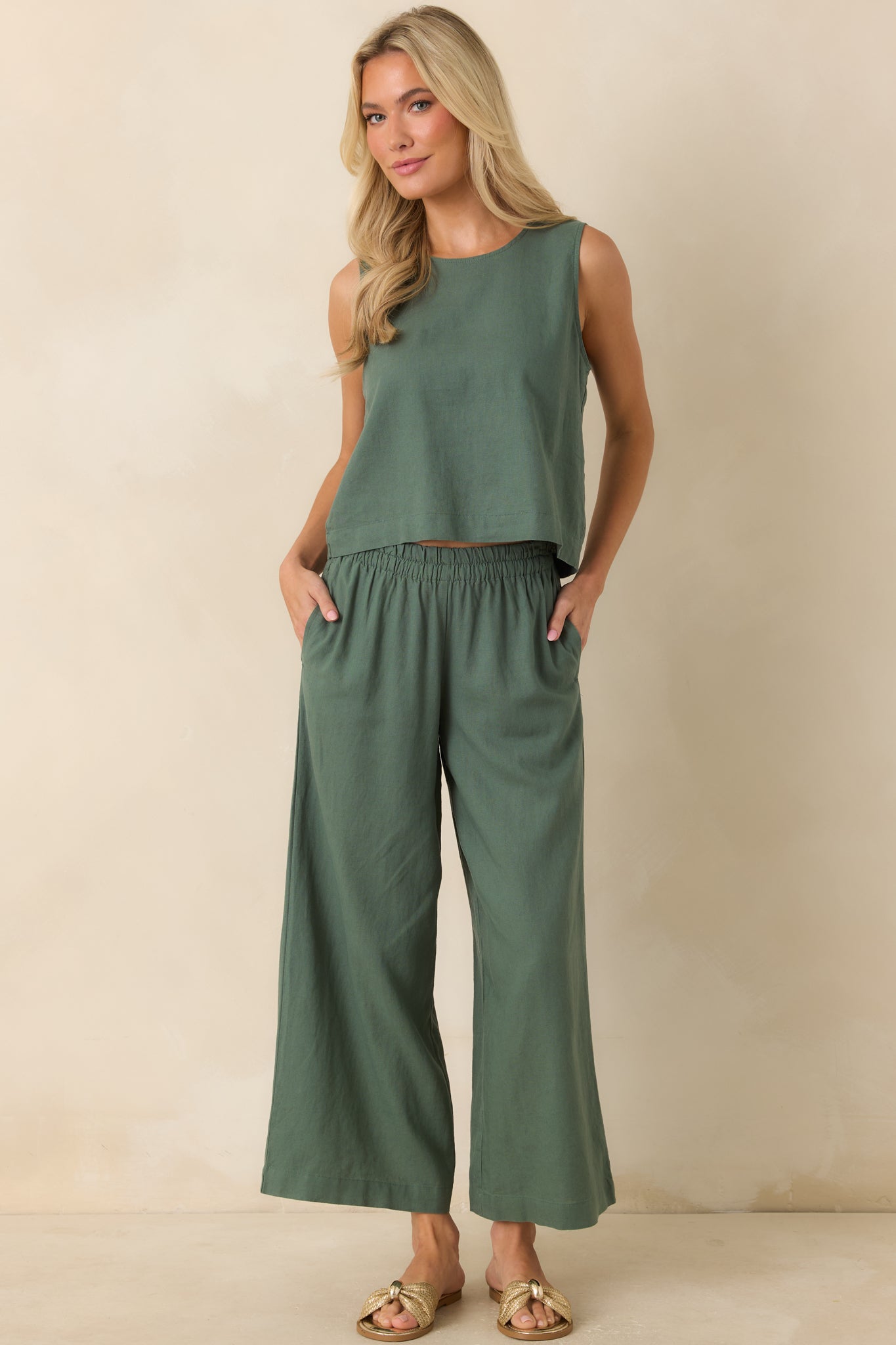 Everglade green wide-leg pants featuring a relaxed silhouette, high-rise elastic waistband, and breathable linen rayon blend fabric.