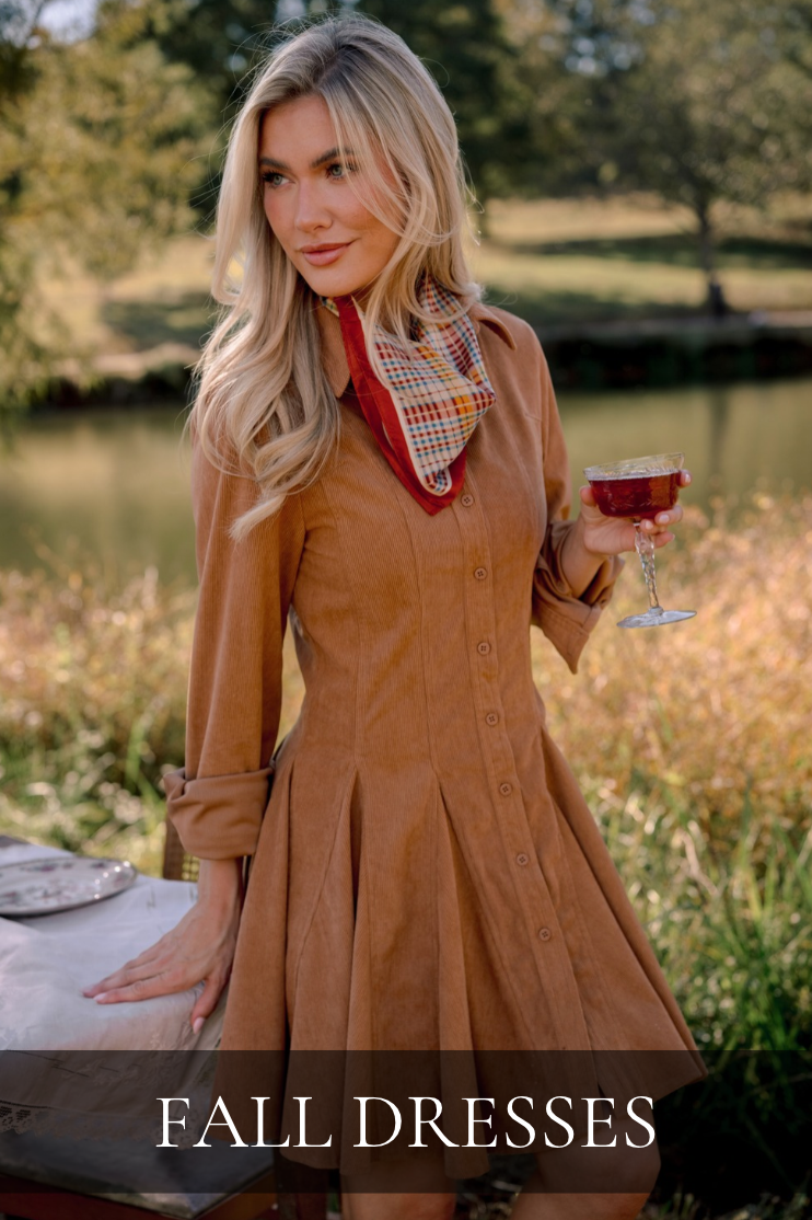 Model wearing a camel corduroy mini dress. Text reads: "Fall Dresses."