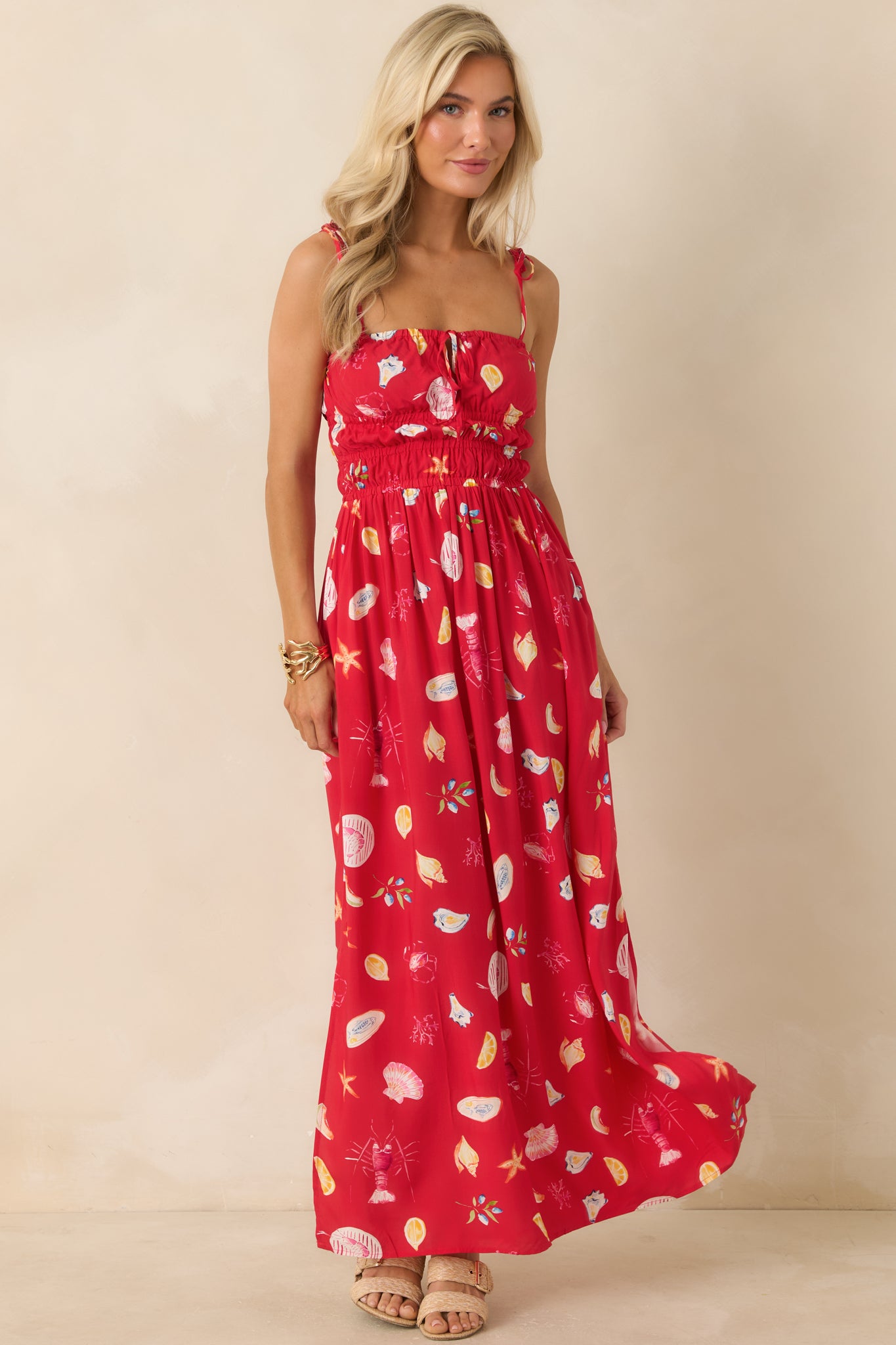 Feminine maxi dress showcasing adjustable straps, a flattering bodice, and graceful movement throughout.