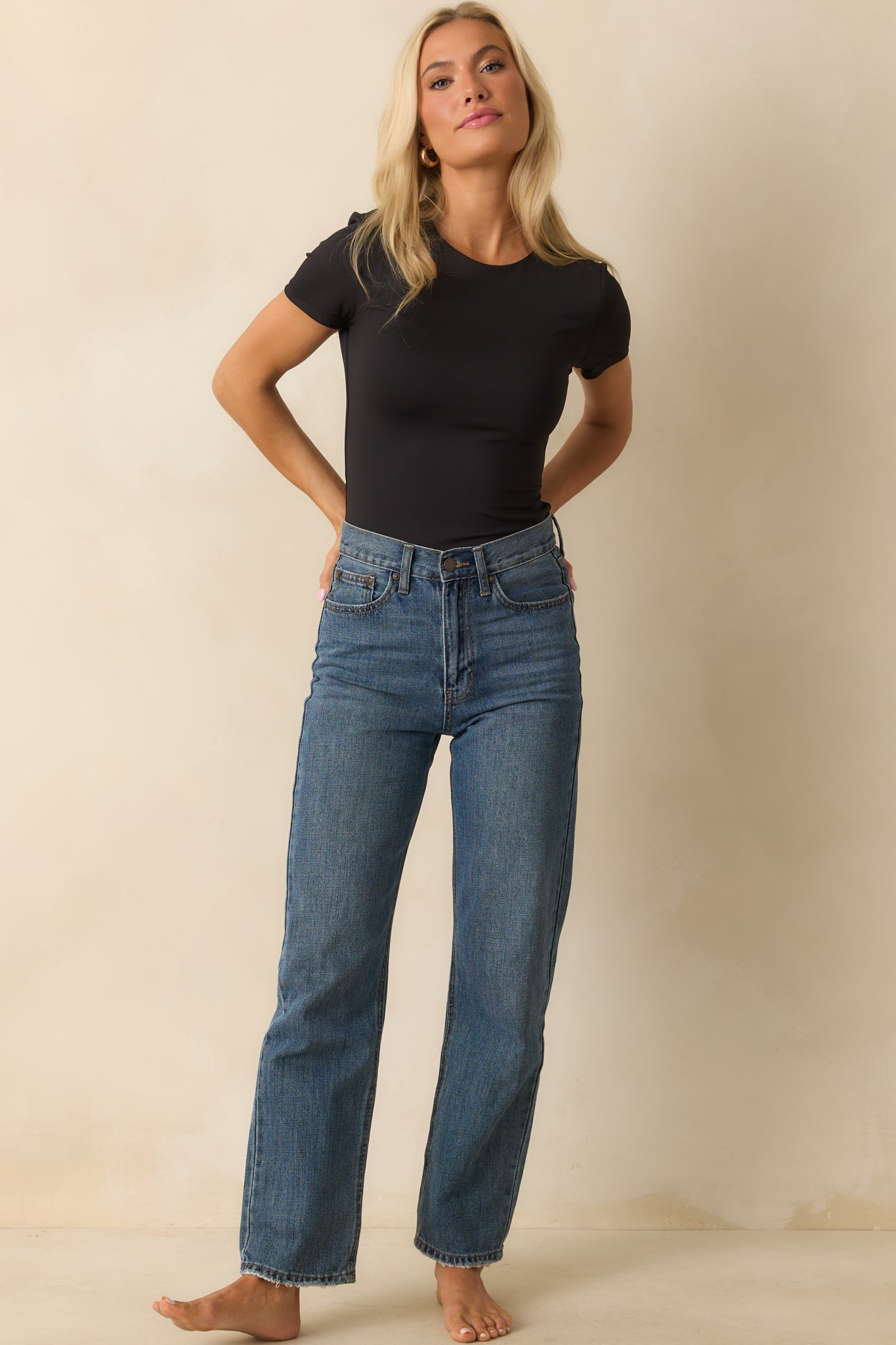 Fitted short sleeve tee showcasing the stretch fabric and classic black color.