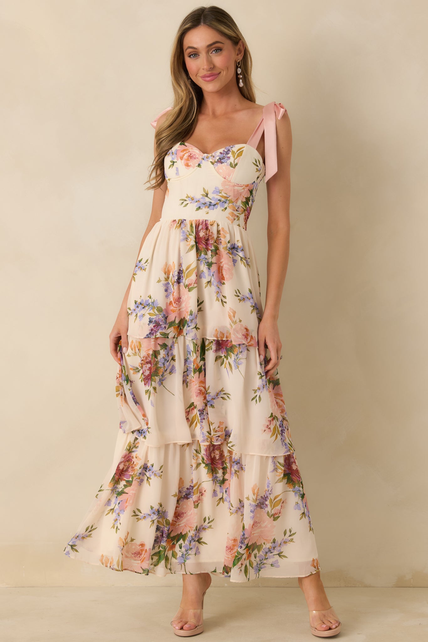 Floral chiffon maxi dress in blush tones featuring structured bust cups and a fitted bodice.
