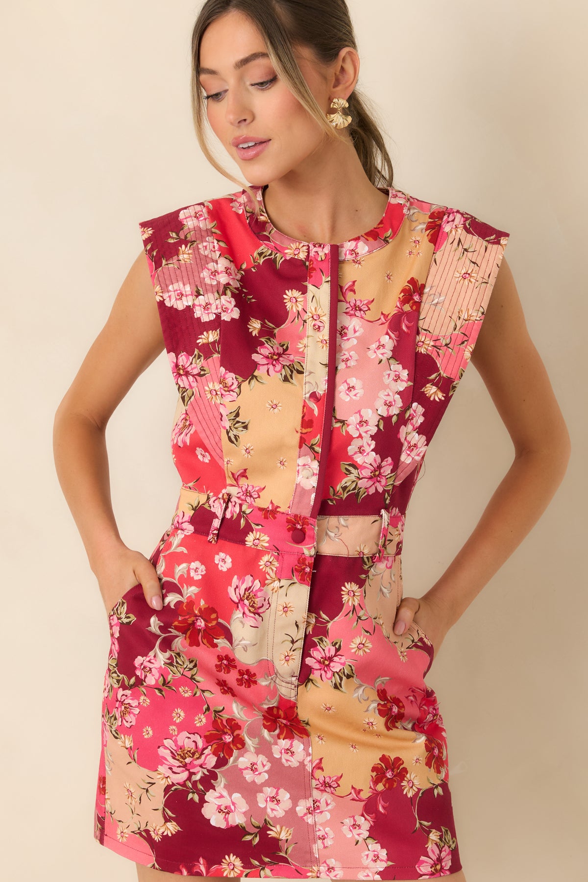 Front of the floral denim mini dress with a split neckline and neat button-free bodice.