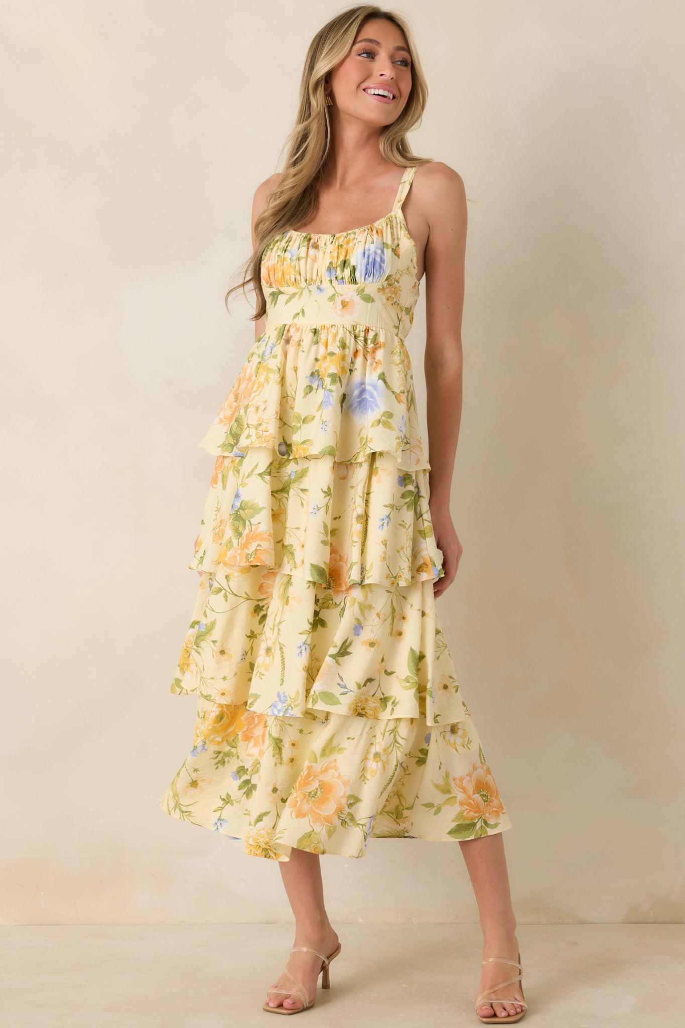 Floral print maxi dress with a comfortable smocked waist detail, adjustable shoulder straps, and an effortless flowing silhouette.