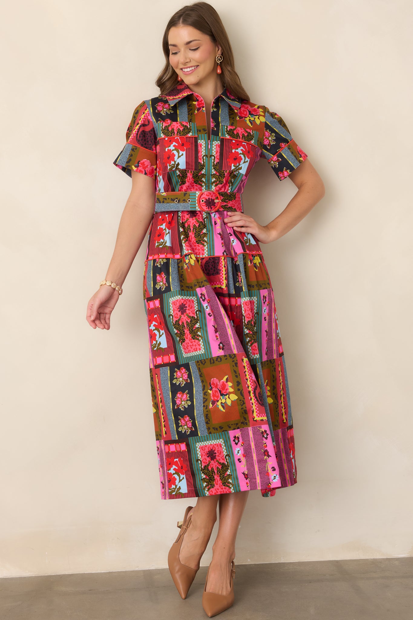 Stretch cotton-blend dress showcasing its mixed floral, striped, and framed motif print, structured collar, defined waist, and flowing tiered silhouette.