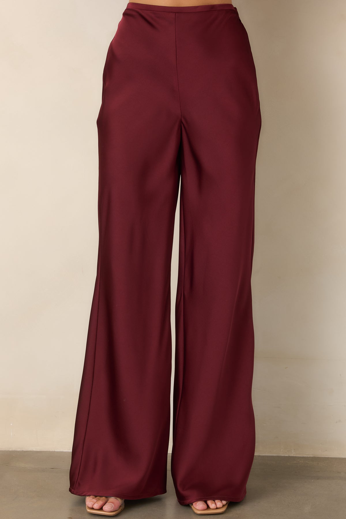 Flowing full-length pants with a polished flat-front waistband and relaxed wide-leg design.