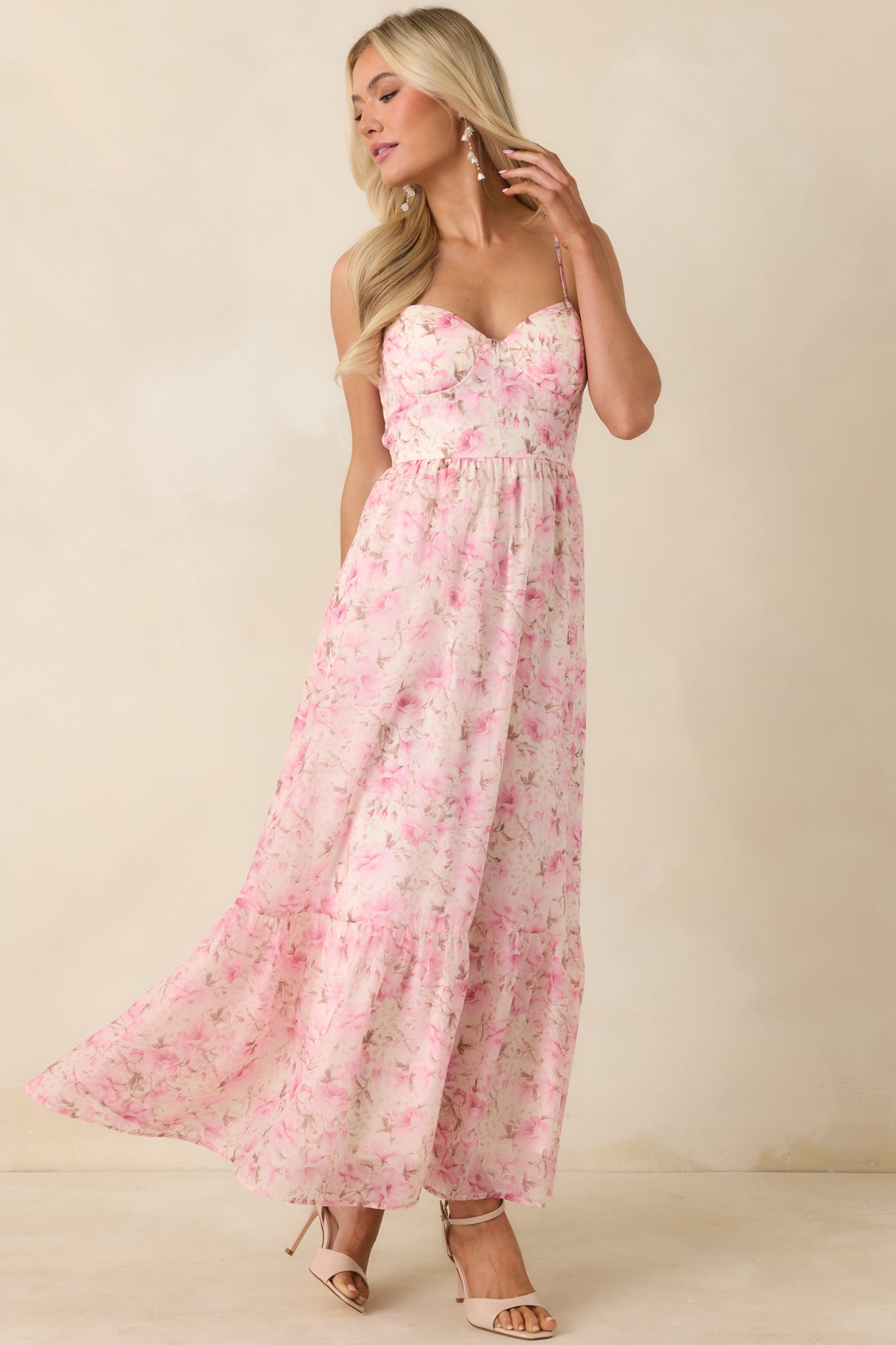 Flowing pink multi floral midi dress with a breathable, lightweight design.
