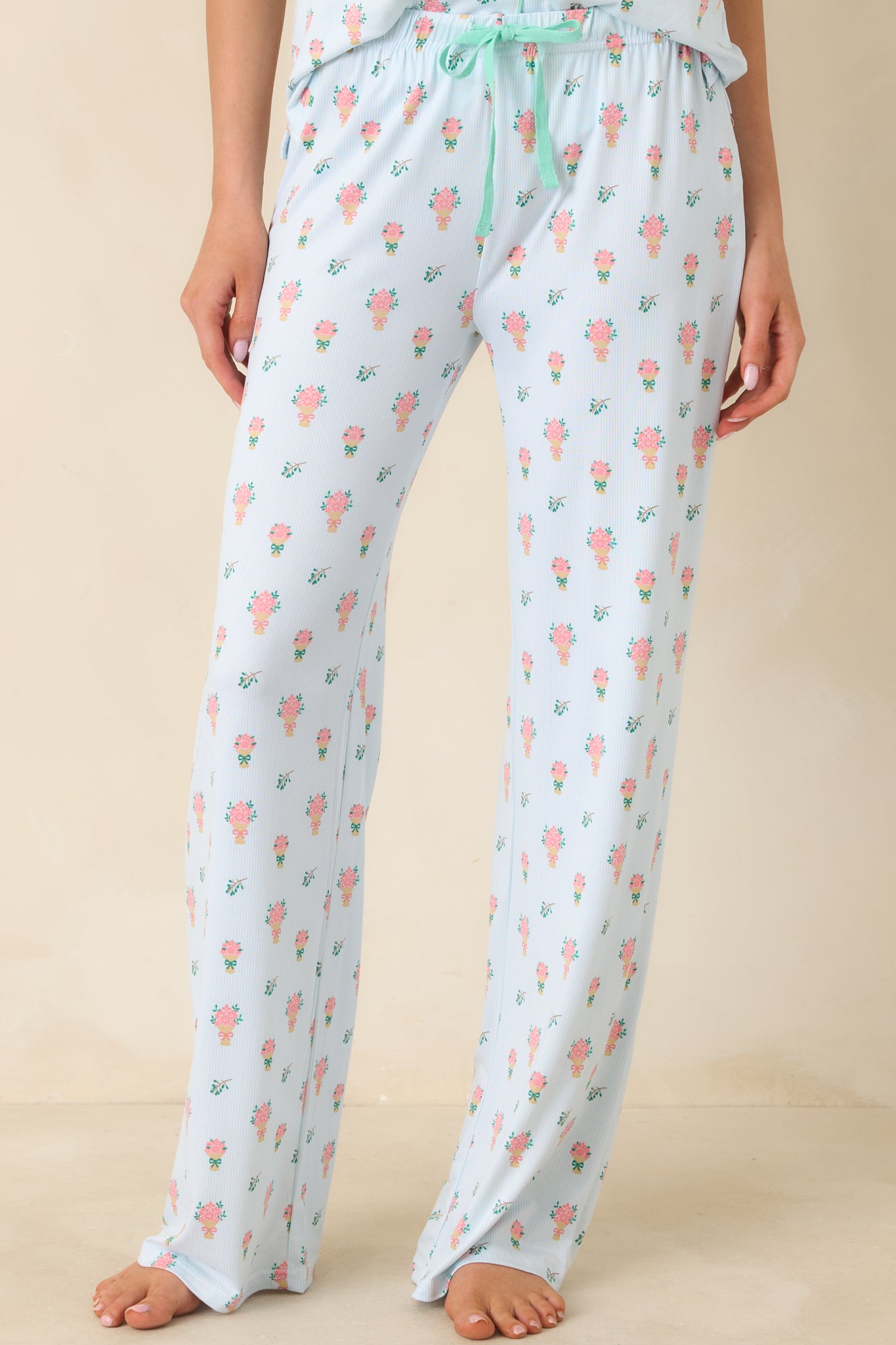Focused view of the relaxed leg silhouette, highlighting the smooth drape of the fabric.