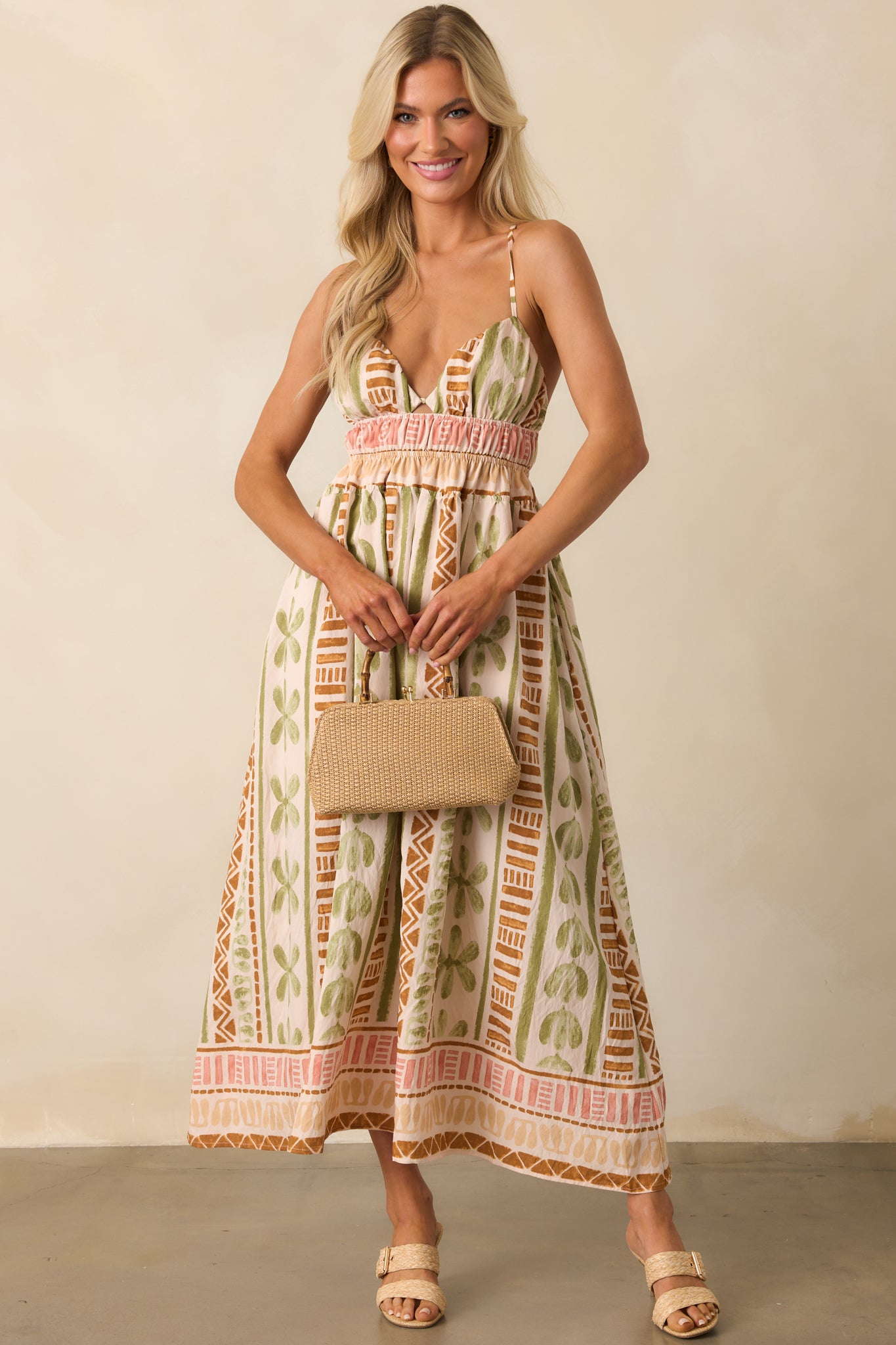 Front-facing angle emphasizing the center bust cutout and ruffle detailing along the skirt.