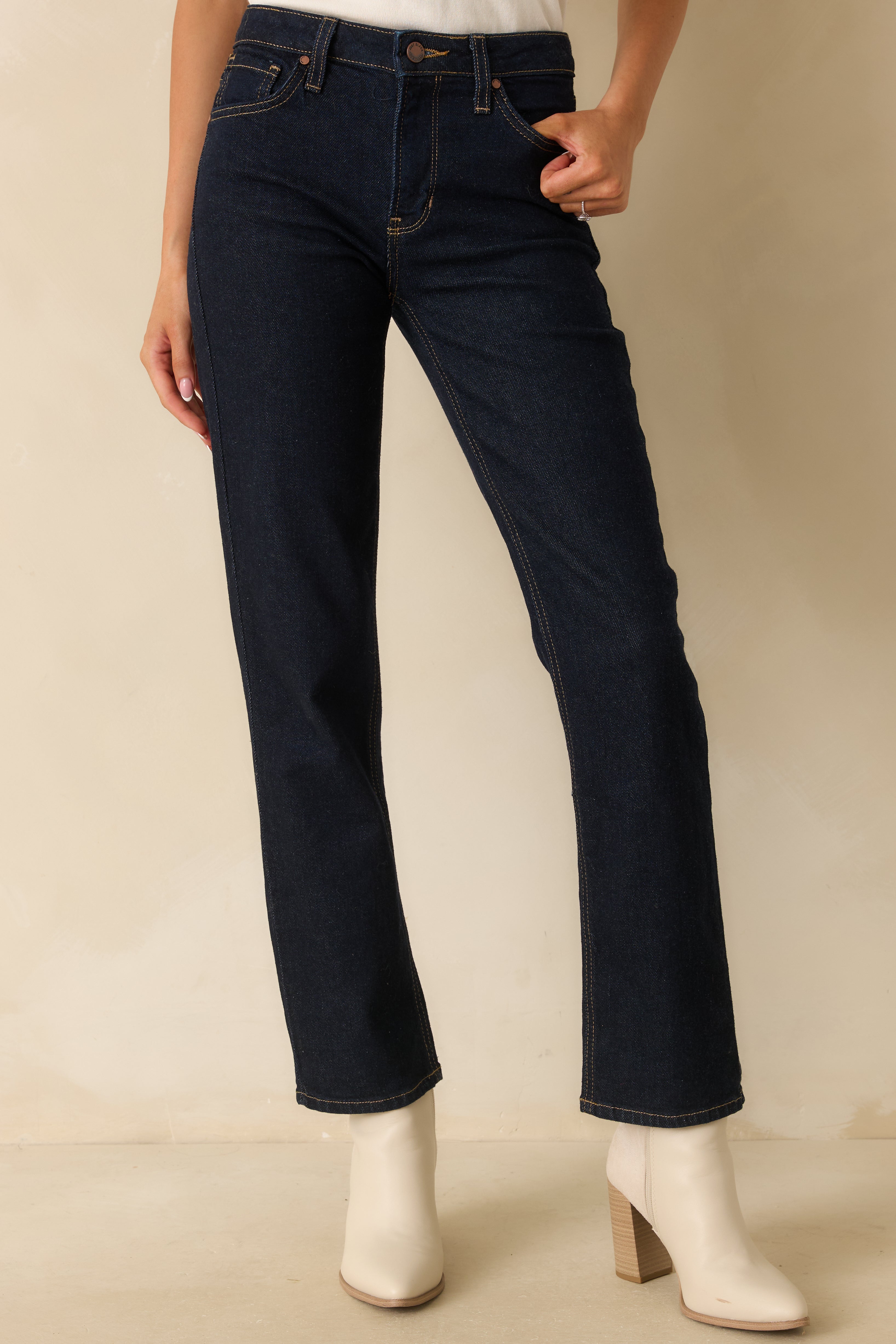 Front angle of the deep indigo jeans emphasizing the straight leg shape and subtle stretch for everyday comfort.