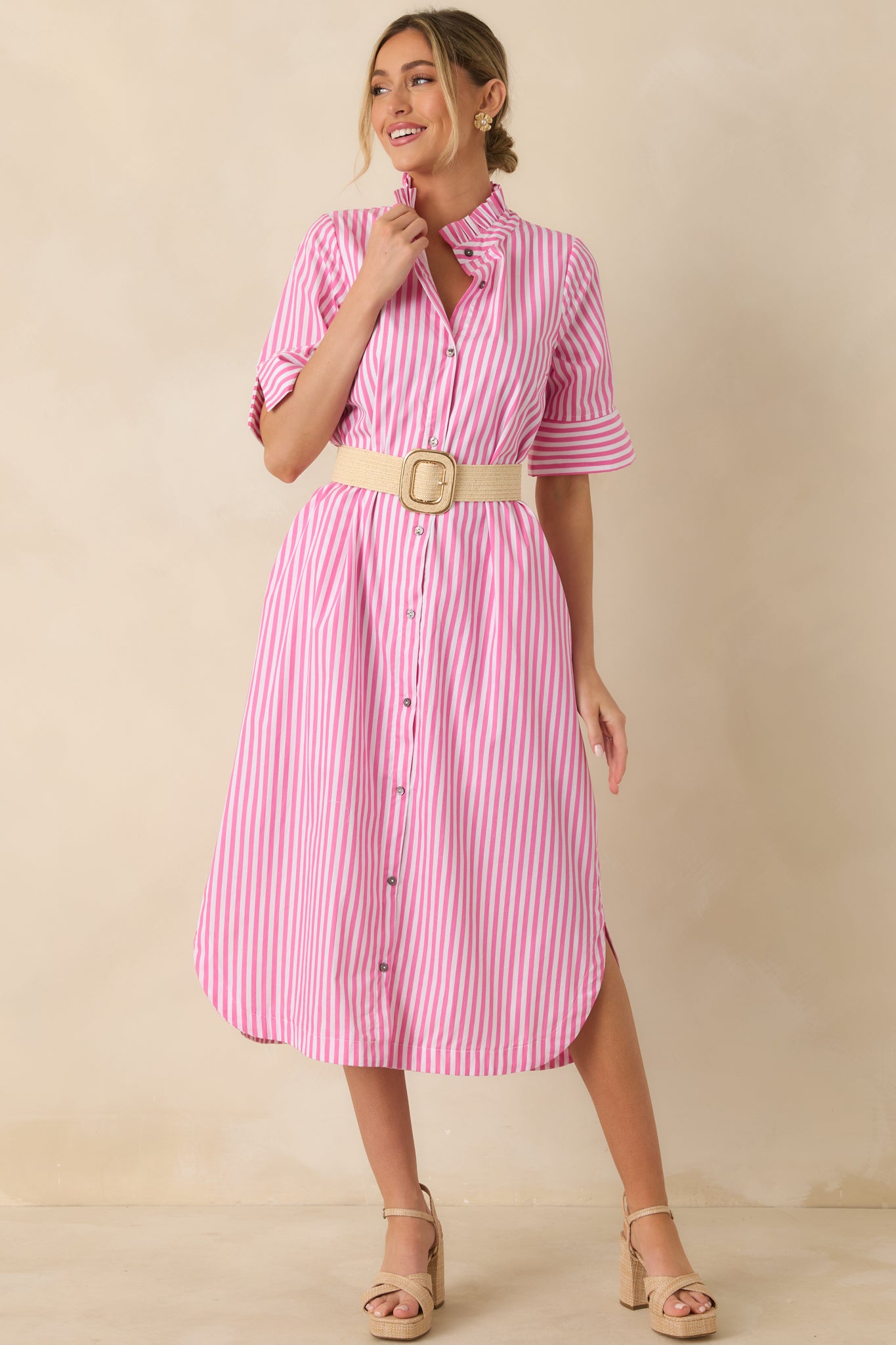 Front angle emphasizing the ruffled collar and short sleeve construction.